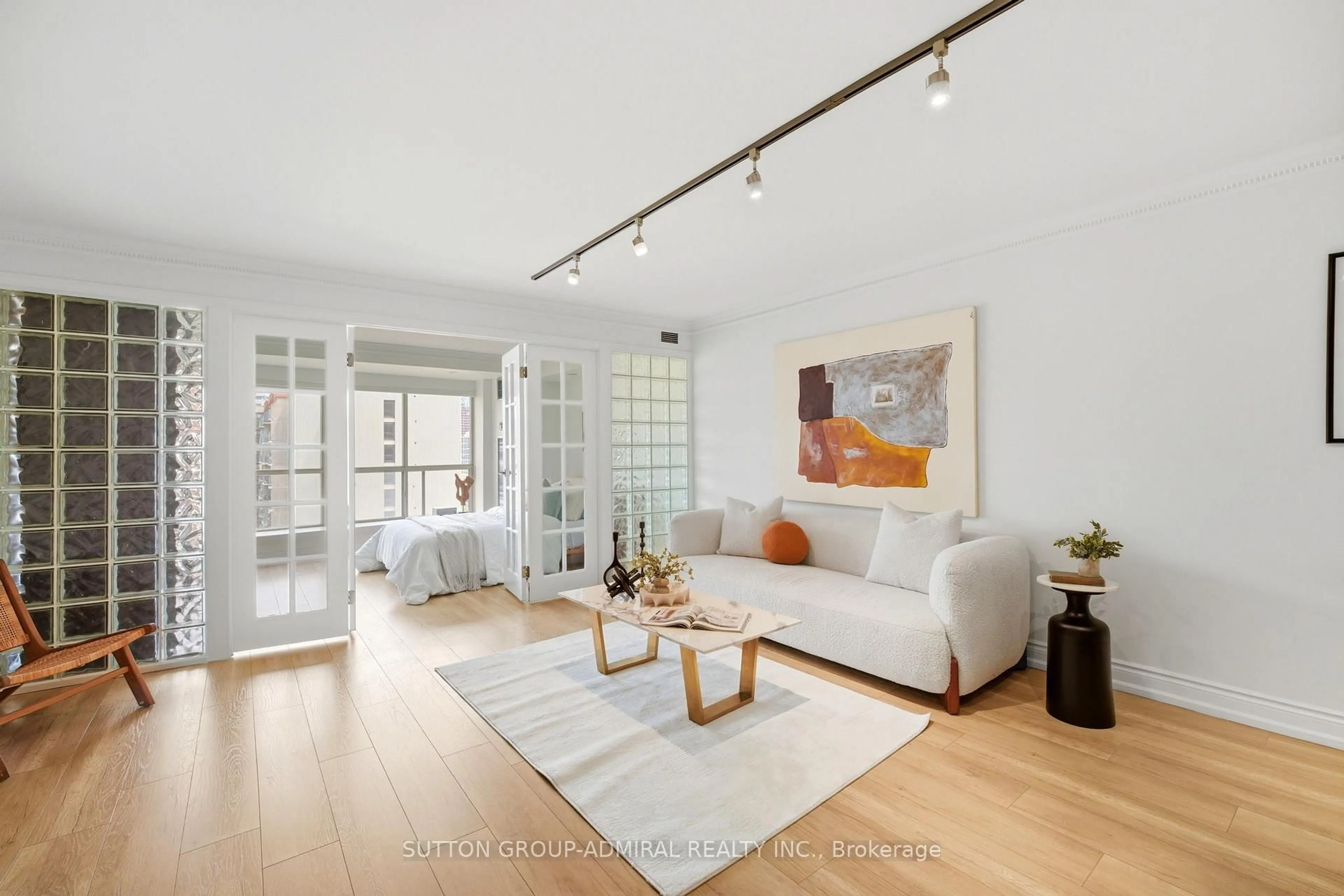 Living room with furniture, wood/laminate floor for 25 The Esplanade #1115, Toronto Ontario M5E 1W5