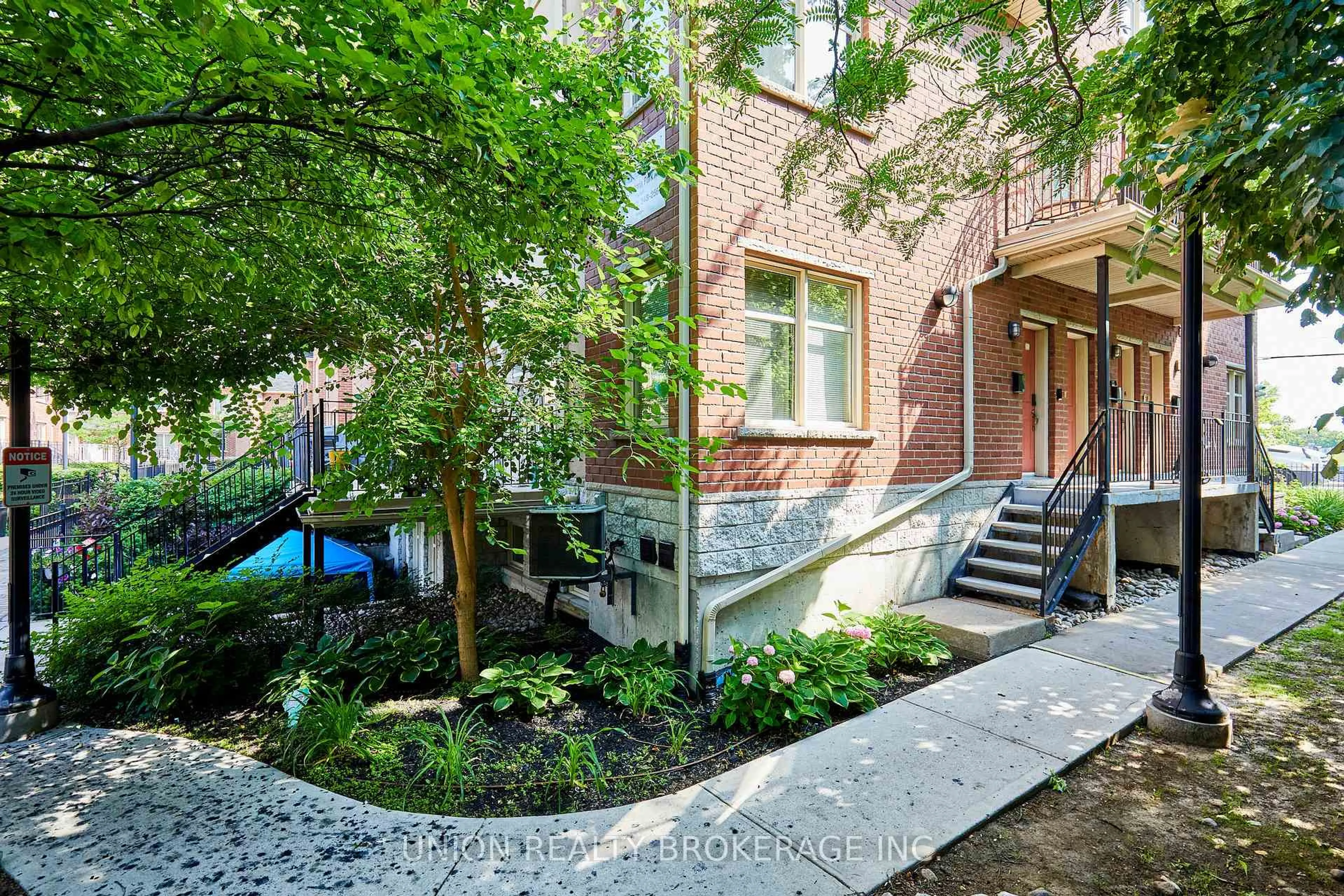 Home with brick exterior material, street for 1496 Victoria Park Ave #256, Toronto Ontario M4A 2M6