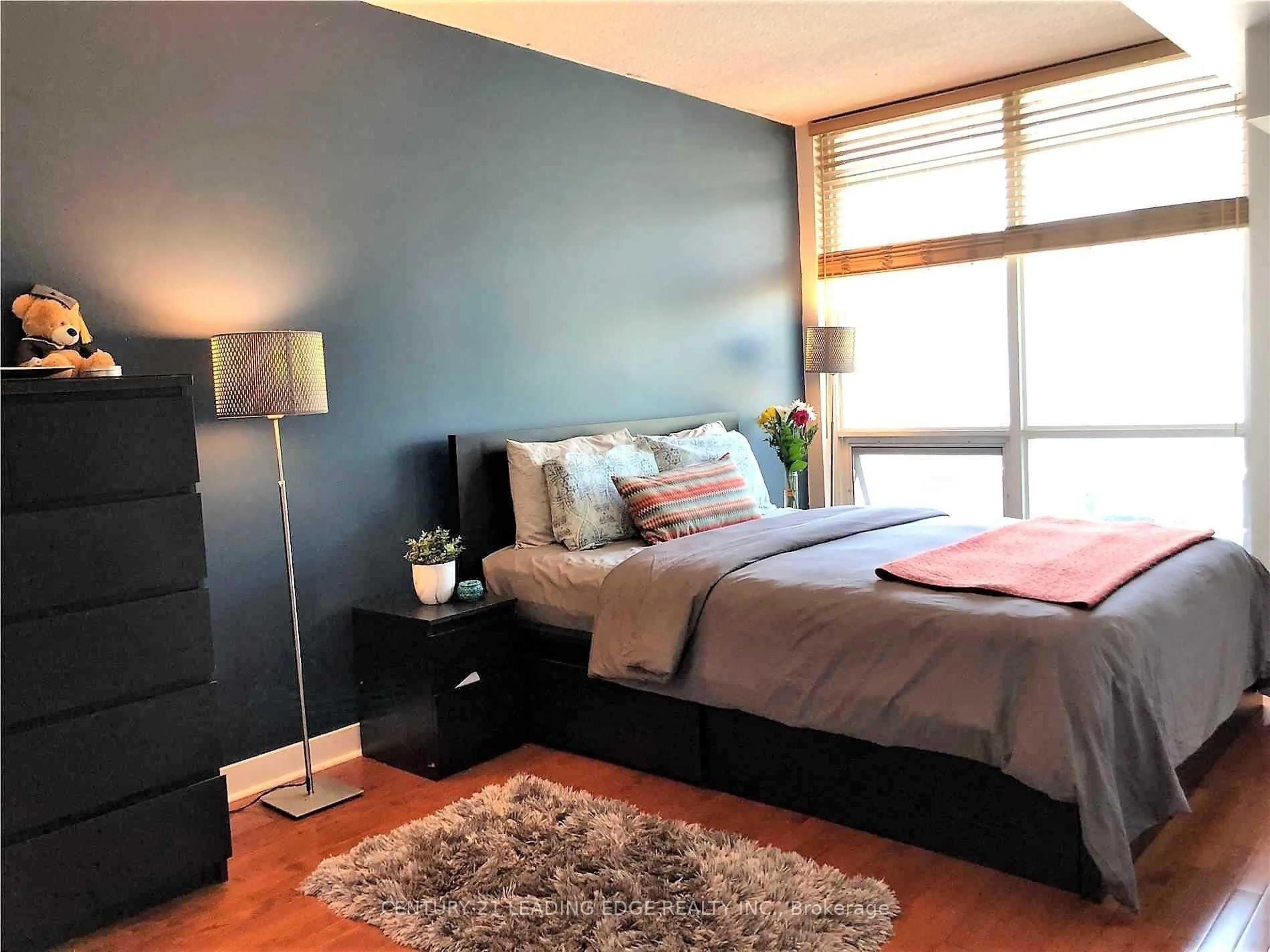Bedroom with bed, wood/laminate floor for 11 Brunel Crt #201, Toronto Ontario M5V 3Y3