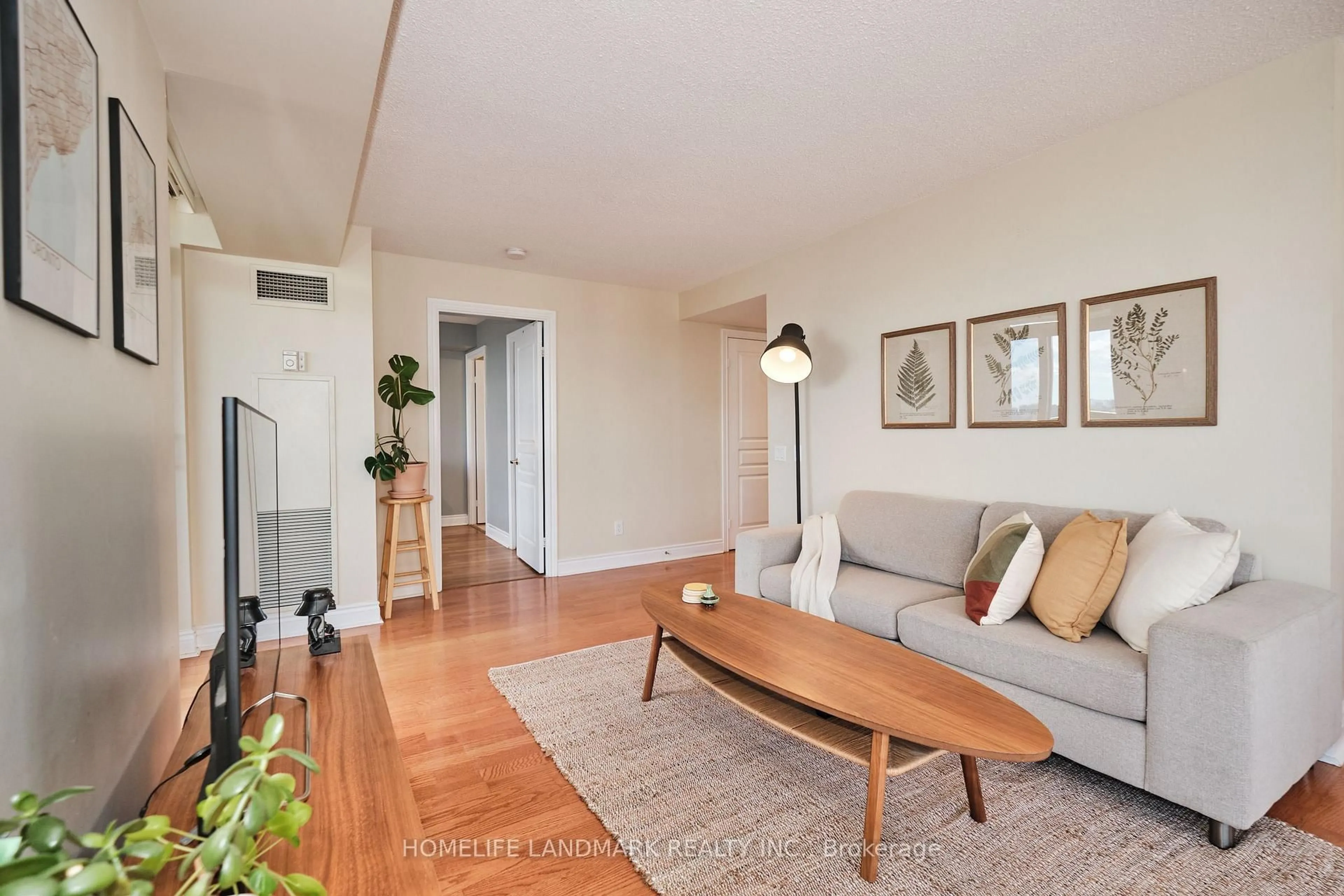 Living room with furniture, wood/laminate floor for 15 Northtown Way #2119, Toronto Ontario M2N 7A2