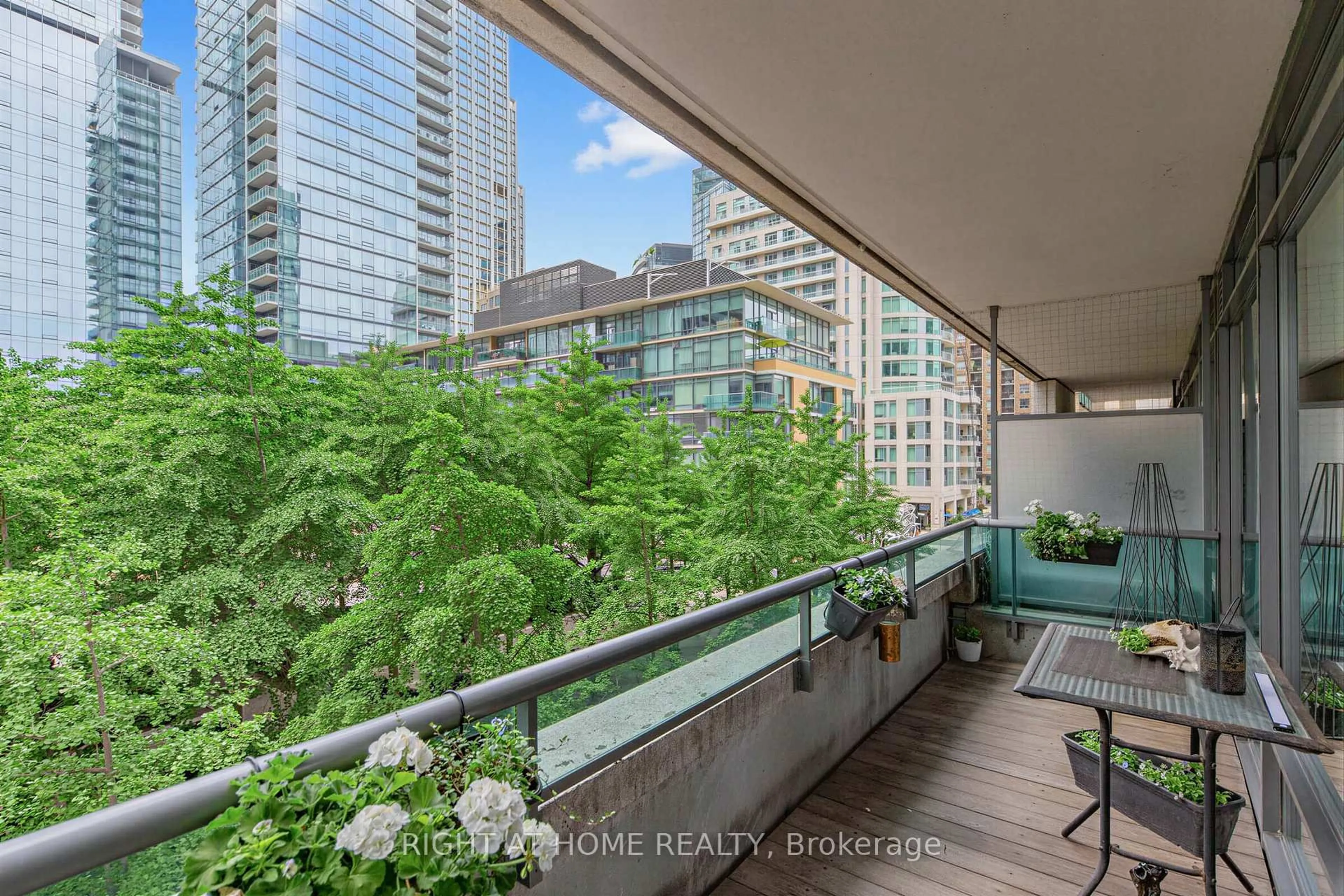 Balcony in the apartment, city buildings view from balcony for 18 Yorkville Ave #305, Toronto Ontario M4W 3Y8