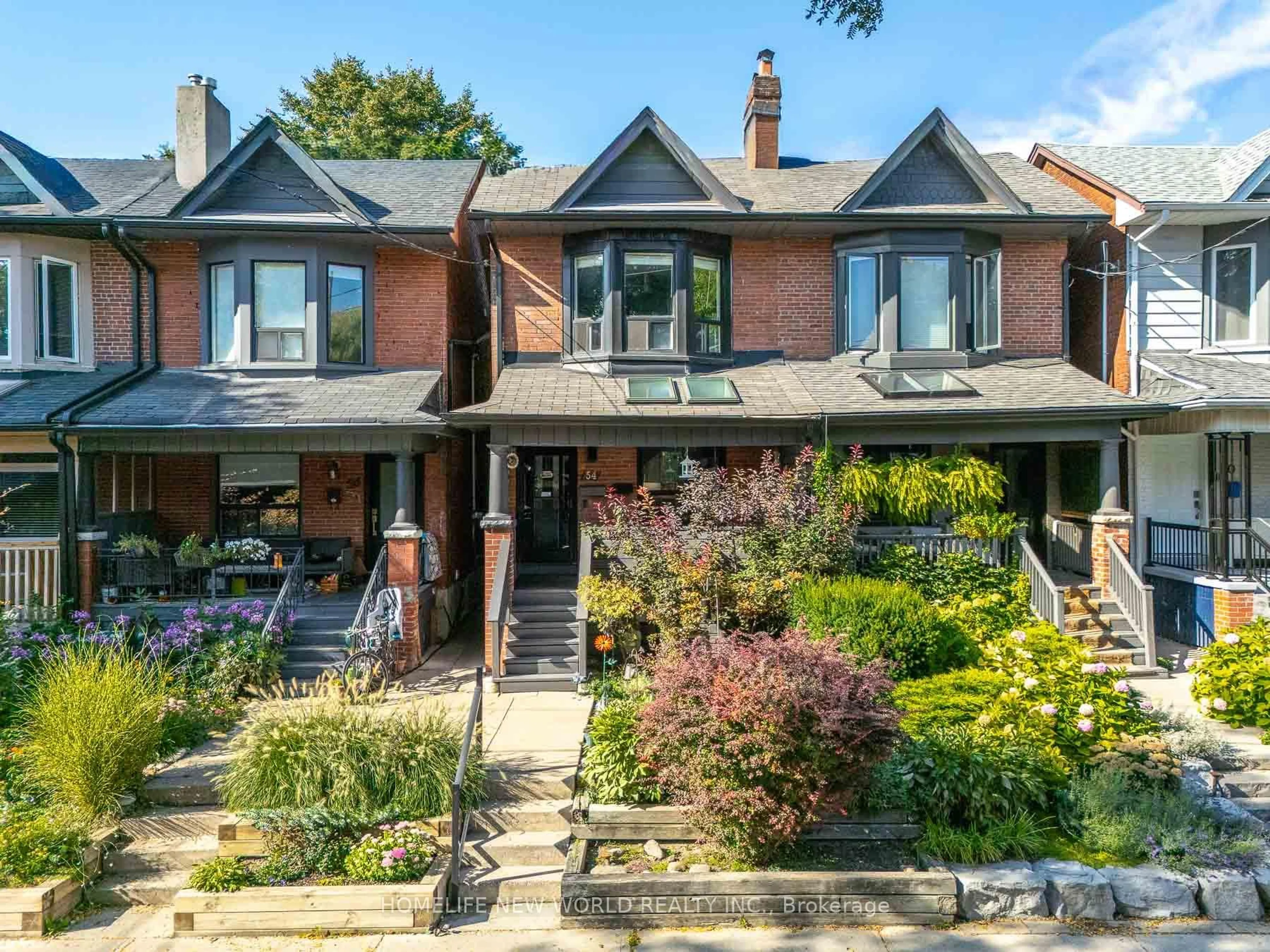 Home with brick exterior material, street for 54 Marchmount Rd, Toronto Ontario M6G 2A9