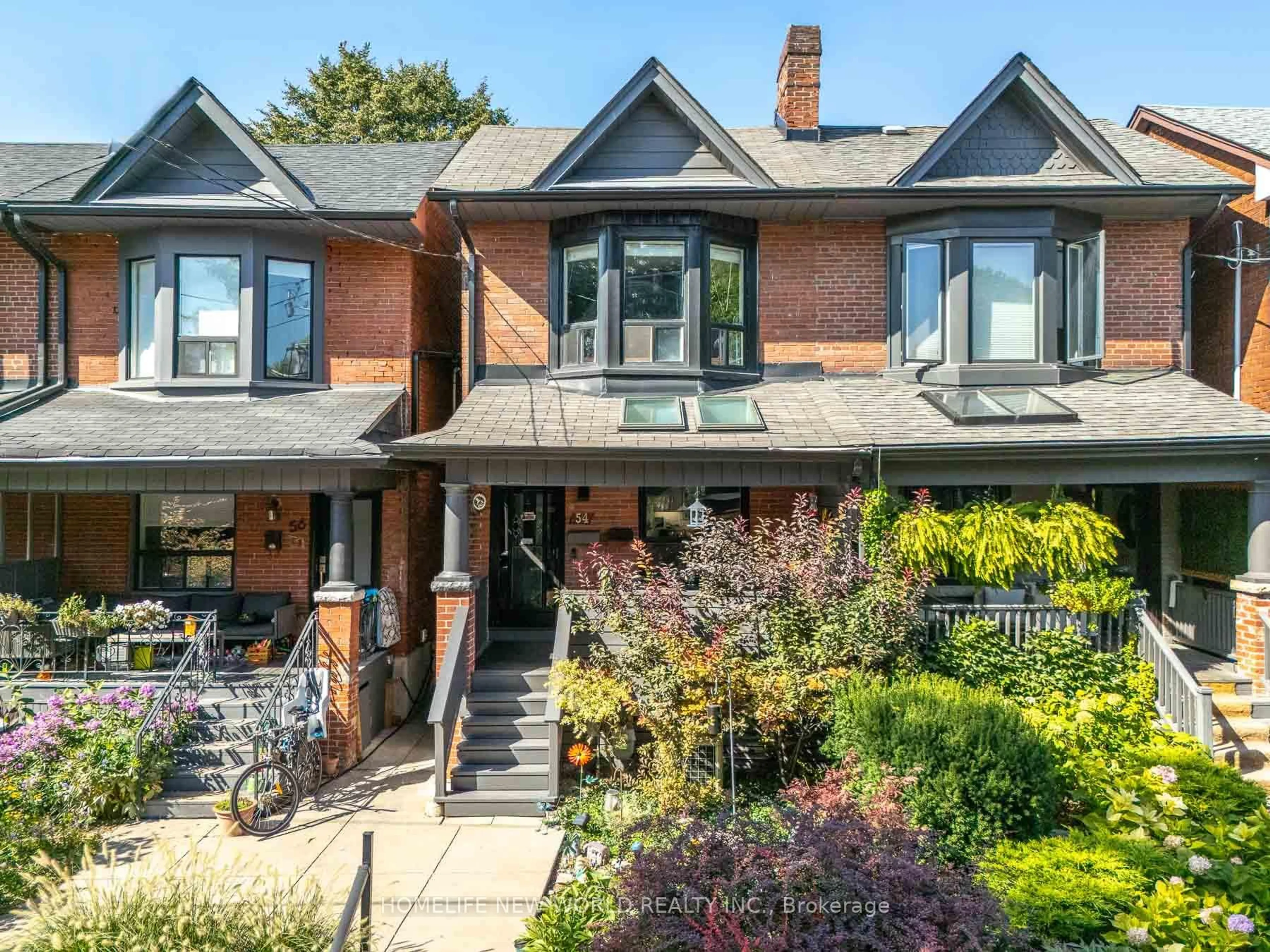 Home with brick exterior material, street for 54 Marchmount Rd, Toronto Ontario M6G 2A9
