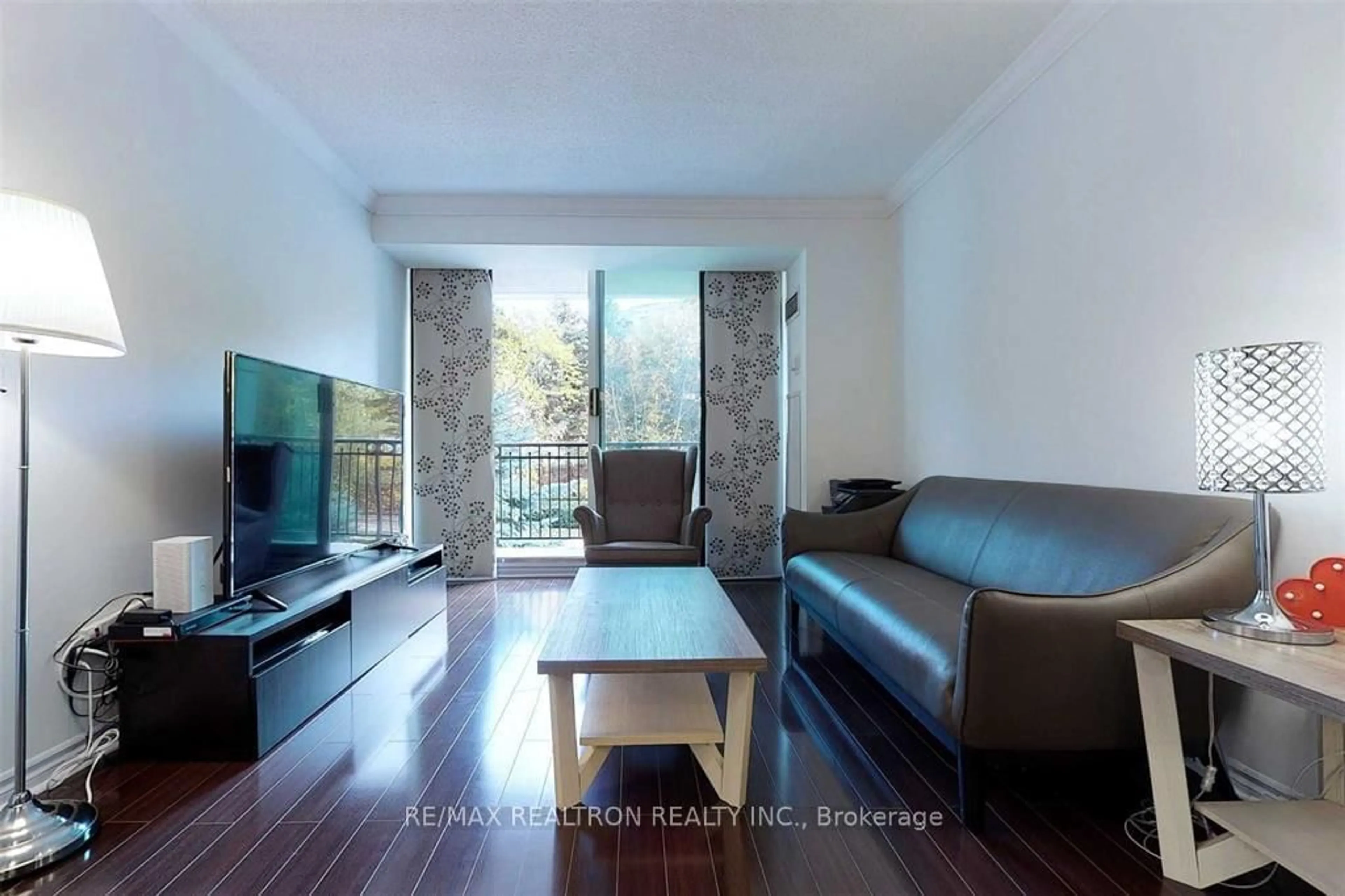 Living room with furniture, wood/laminate floor for 18 William Carson Cres #211, Toronto Ontario M2P 2G6