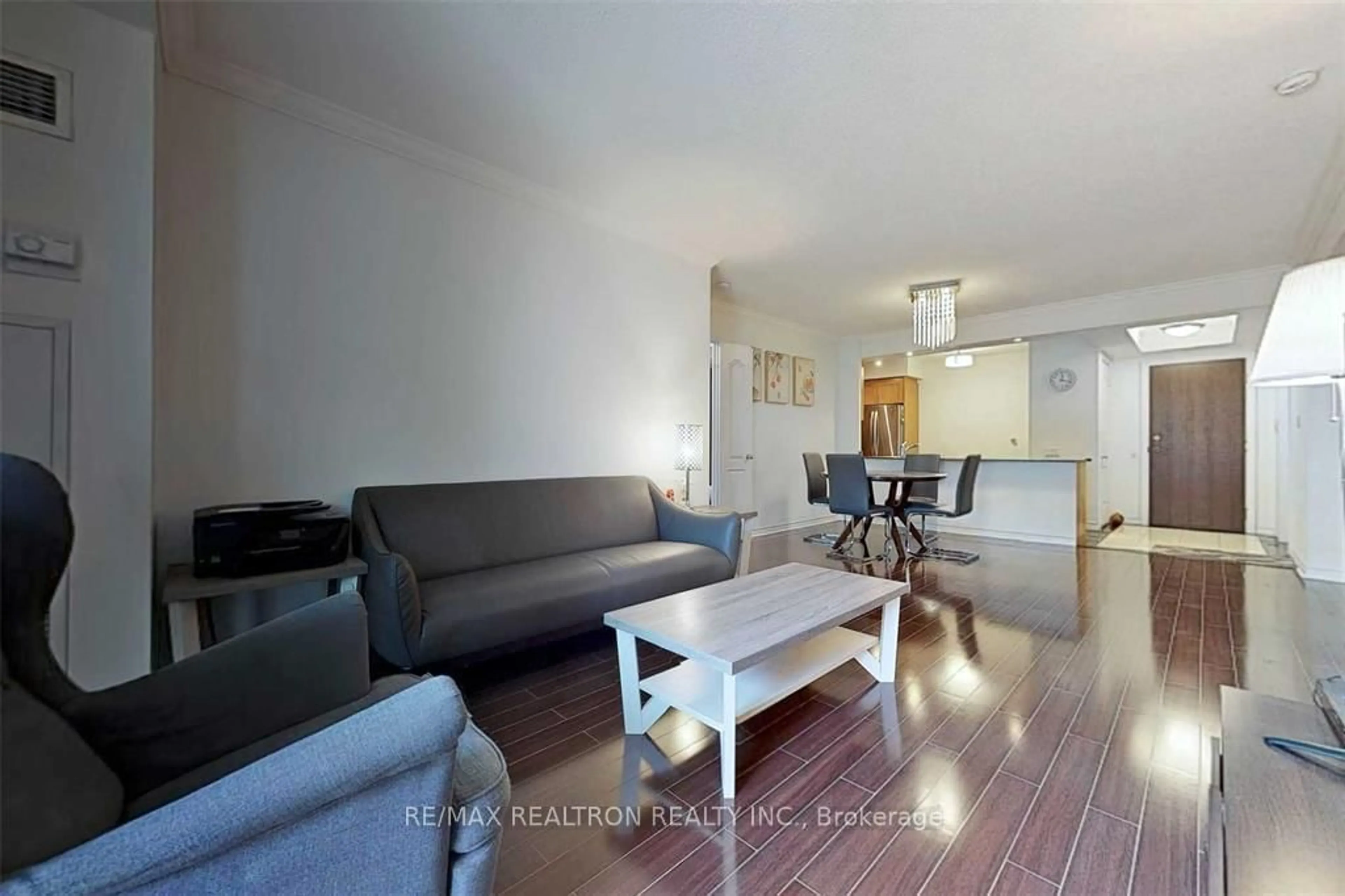 Living room with furniture, wood/laminate floor for 18 William Carson Cres #211, Toronto Ontario M2P 2G6