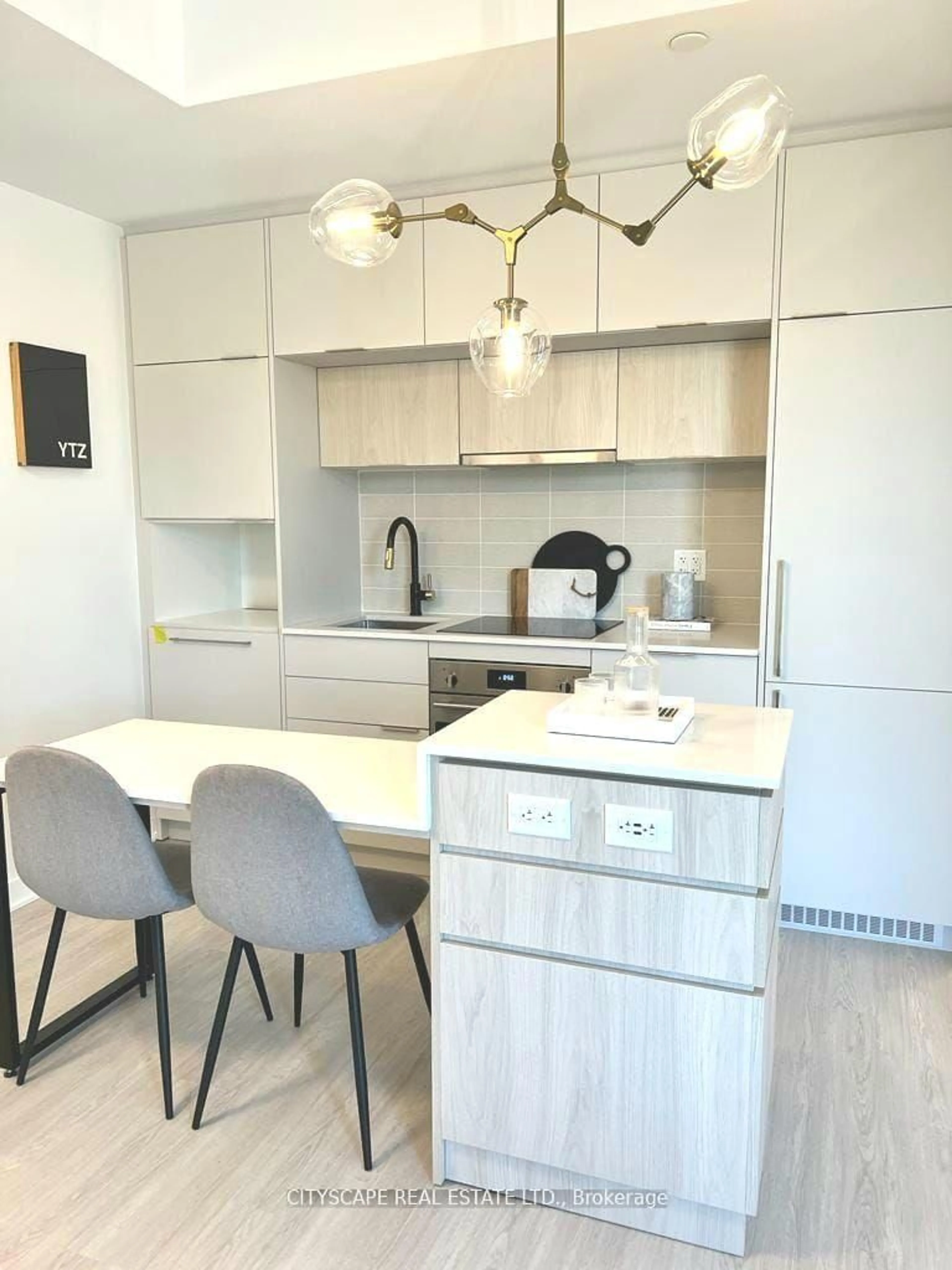 Contemporary kitchen, wood/laminate floor for 185 Alberta Ave #506, Toronto Ontario M6C 0A5