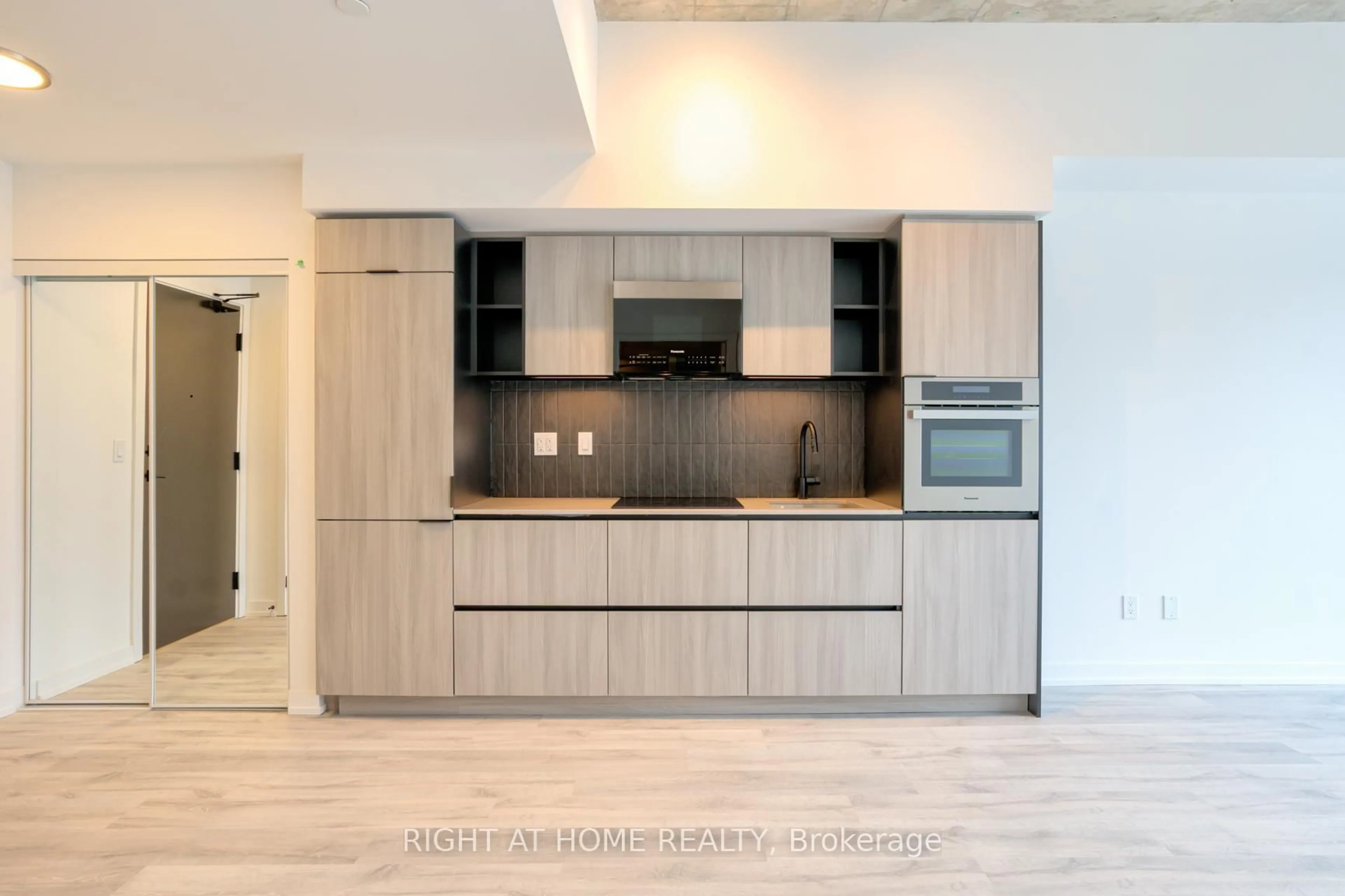 Contemporary kitchen, wood/laminate floor for 2 Augusta Ave #704, Toronto Ontario M5V 0T3