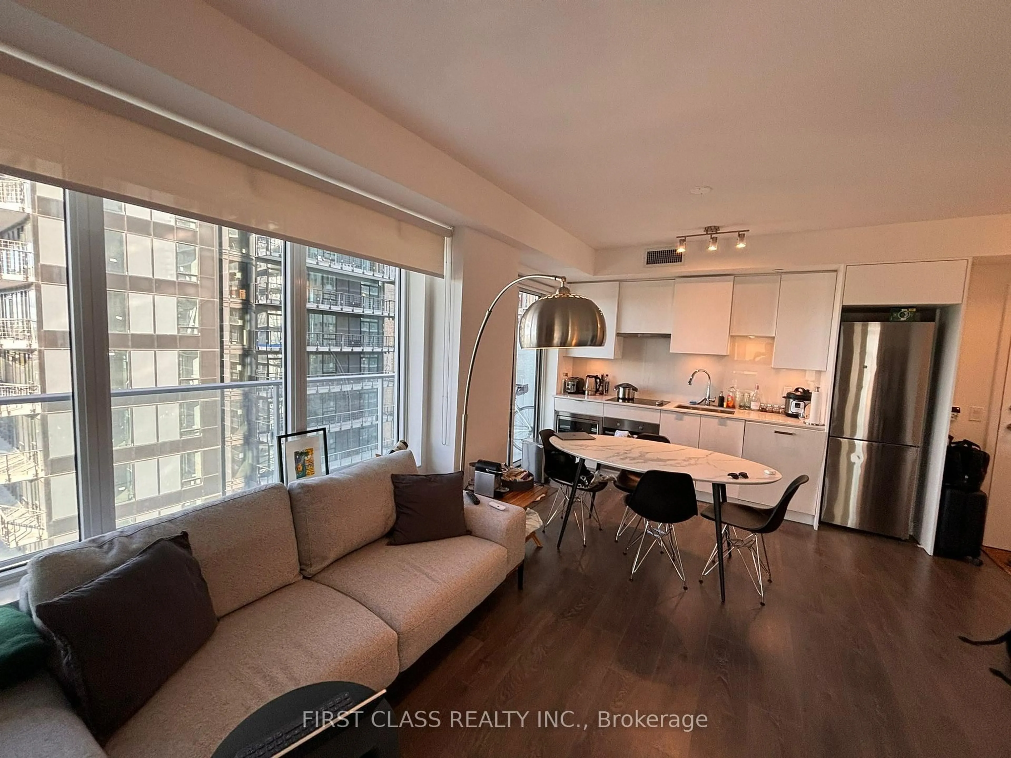 Open concept kitchen, wood/laminate floor for 99 Broadway Ave #2803, Toronto Ontario M4P 0E3