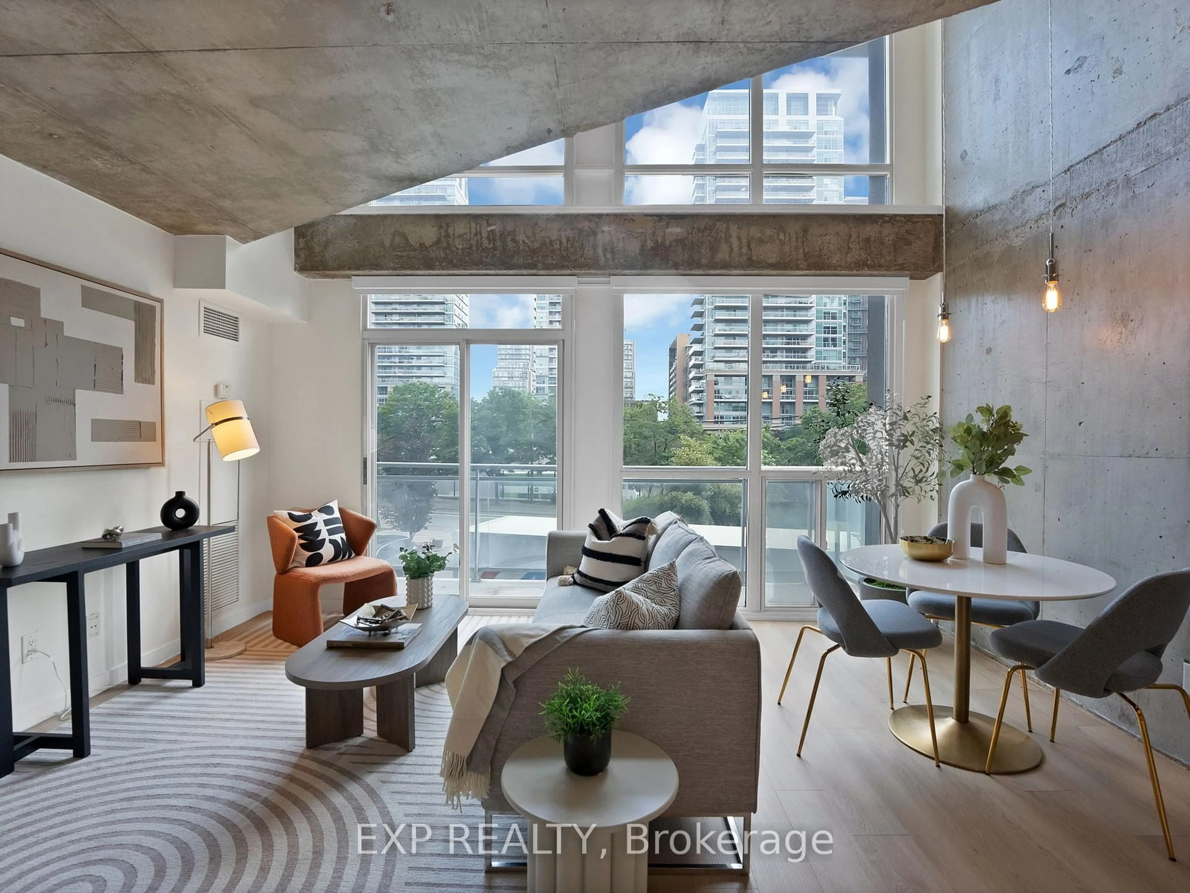 Living room with furniture, cement floor for 1029 King St #246, Toronto Ontario M6K 3M9