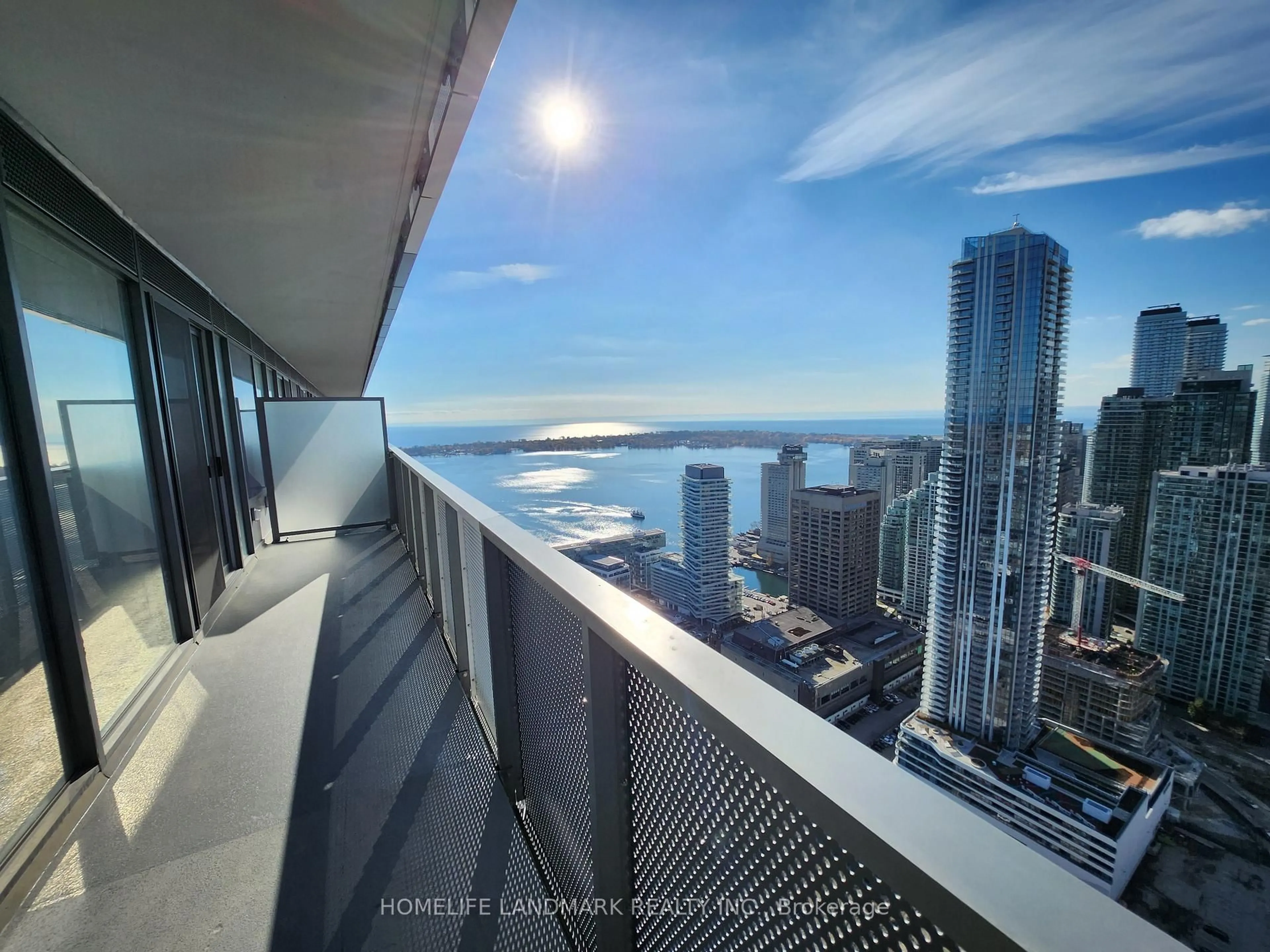 Balcony in the apartment, city buildings view from balcony for 55 Cooper St #5601, Toronto Ontario M5E 0G1
