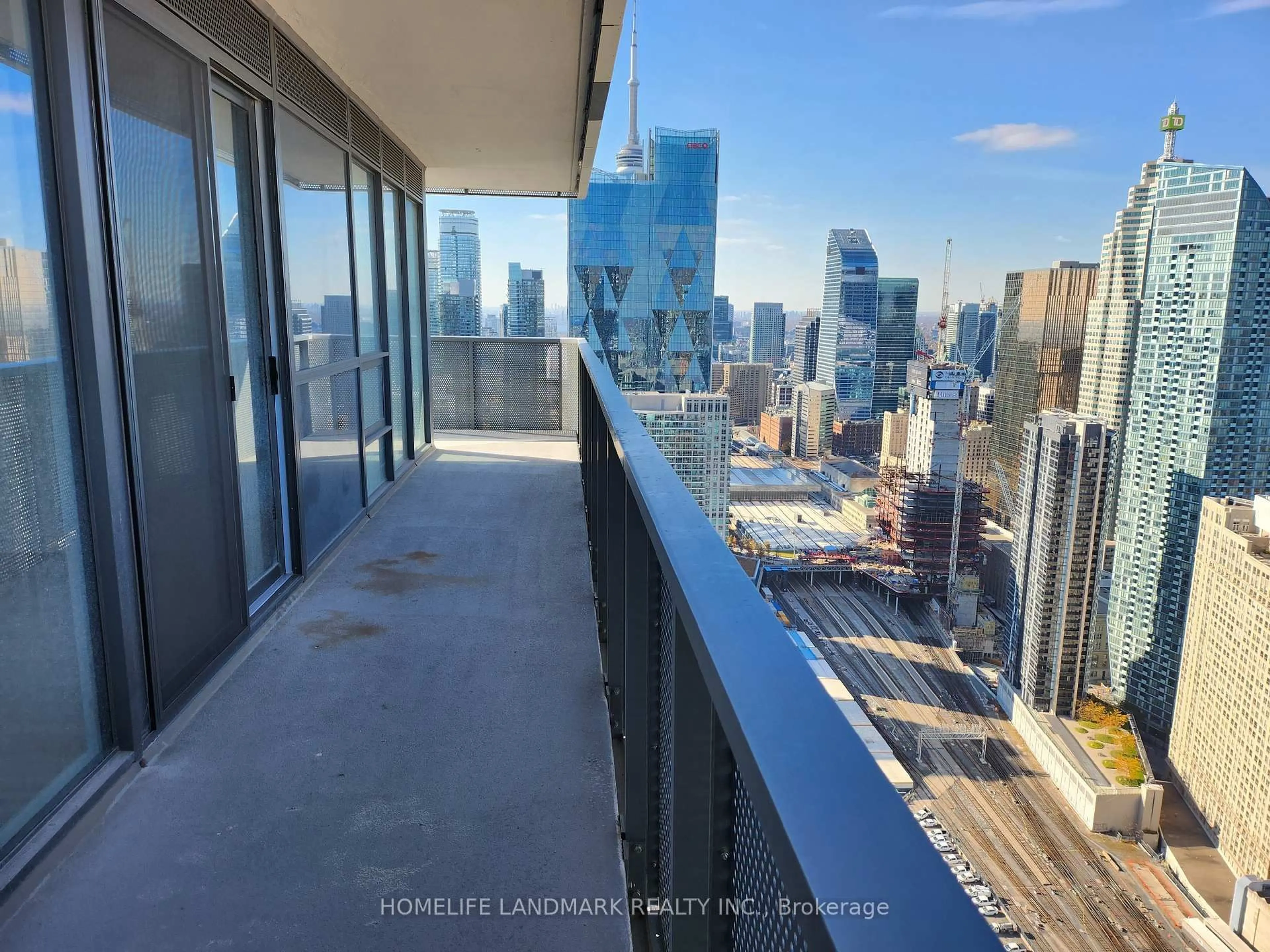 Balcony in the apartment, city buildings view from balcony for 55 Cooper St #5601, Toronto Ontario M5E 0G1
