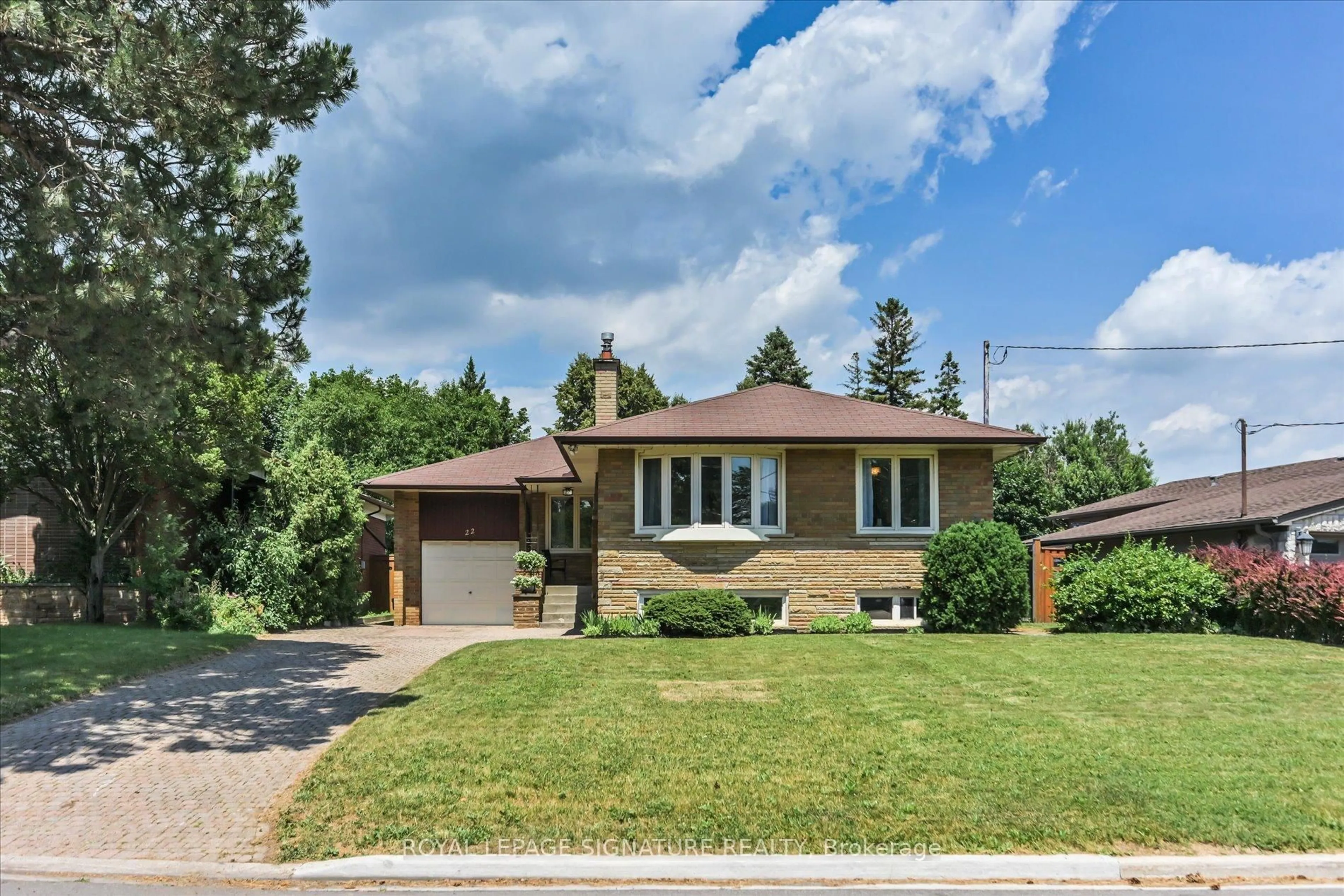 Home with brick exterior material, street for 22 Anewen Dr, Toronto Ontario M4A 1S2