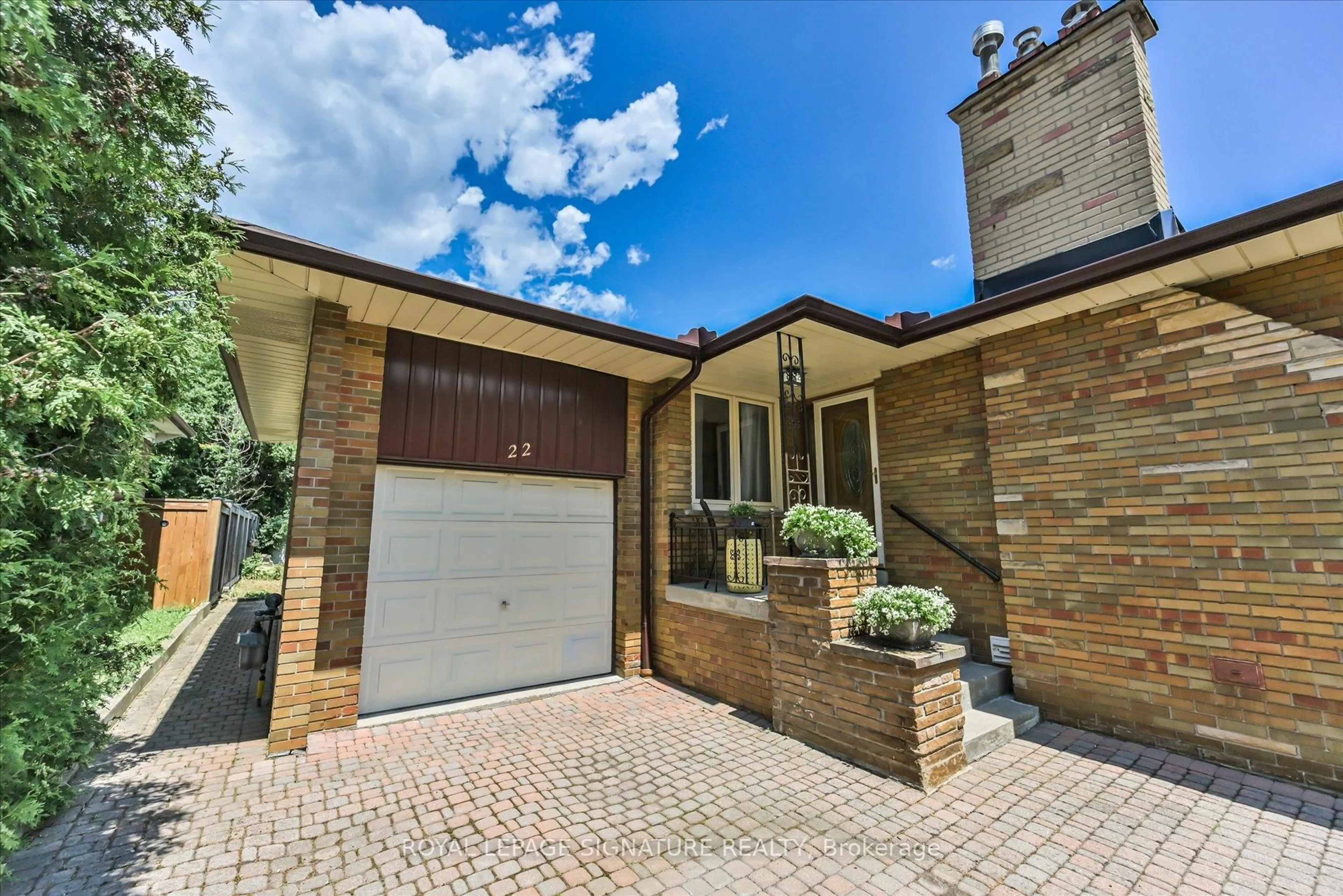 Home with brick exterior material, street for 22 Anewen Dr, Toronto Ontario M4A 1S2