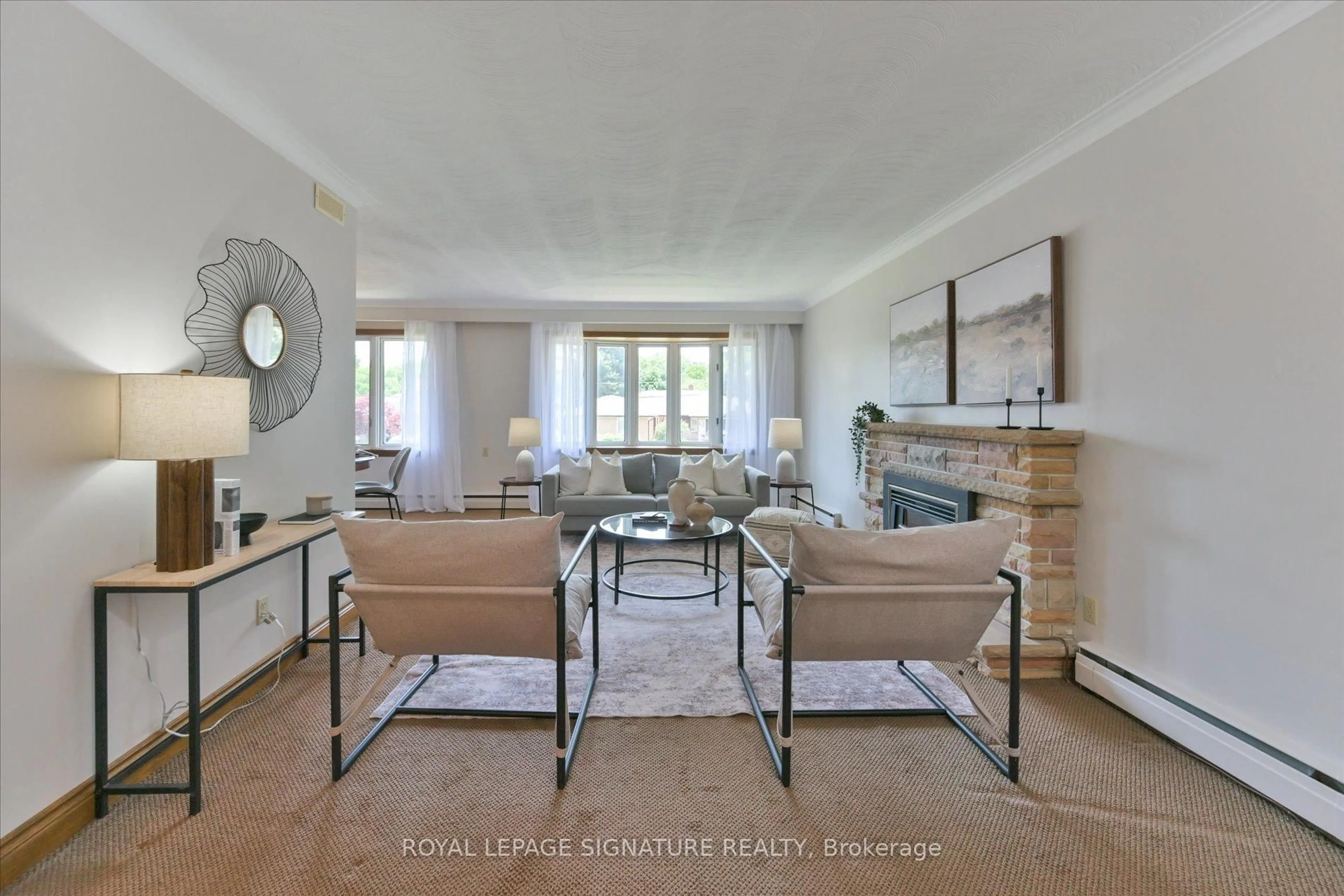 Living room with furniture, unknown for 22 Anewen Dr, Toronto Ontario M4A 1S2