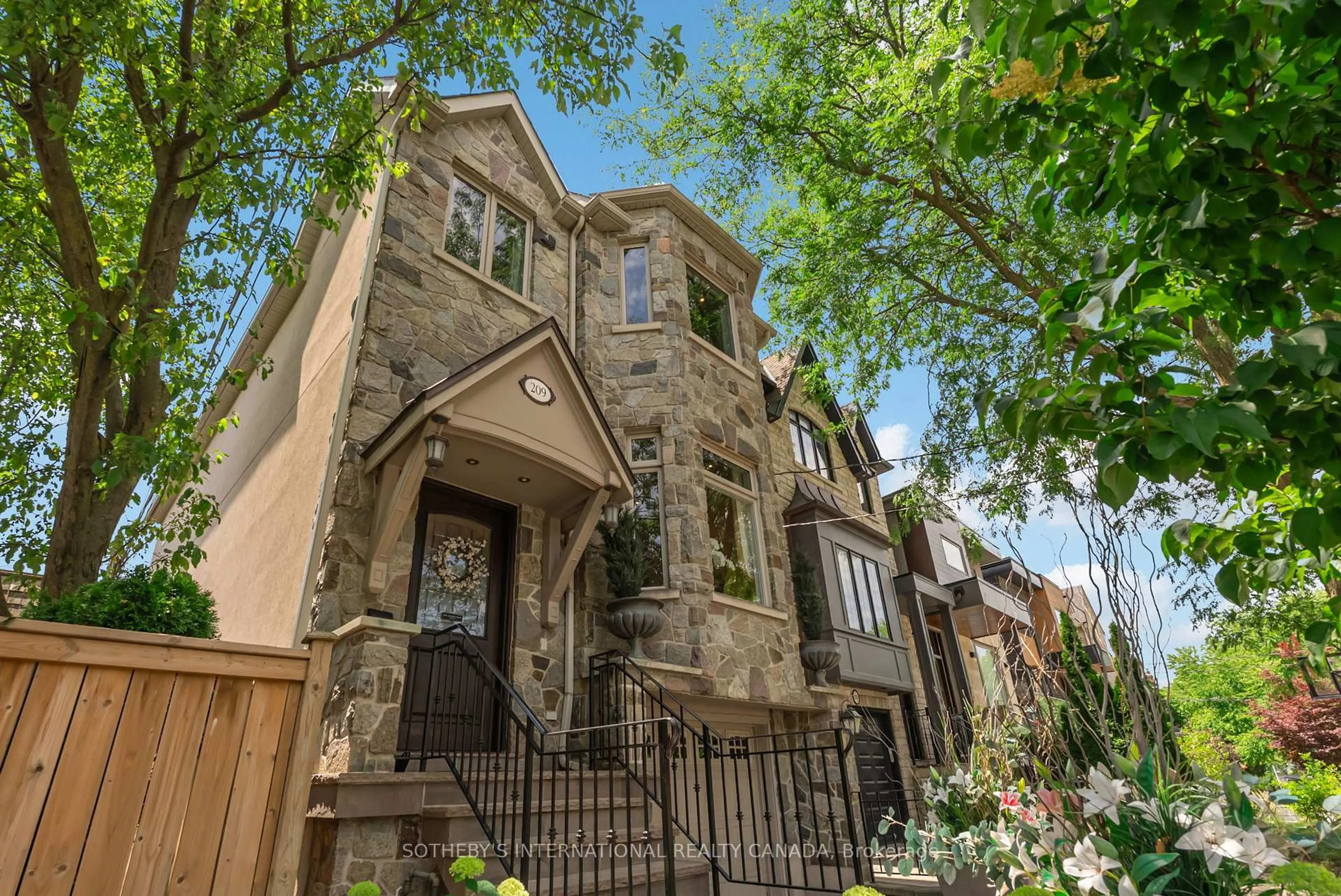 Home with brick exterior material, street for 209 Douglas Ave, Toronto Ontario M5M 1G9