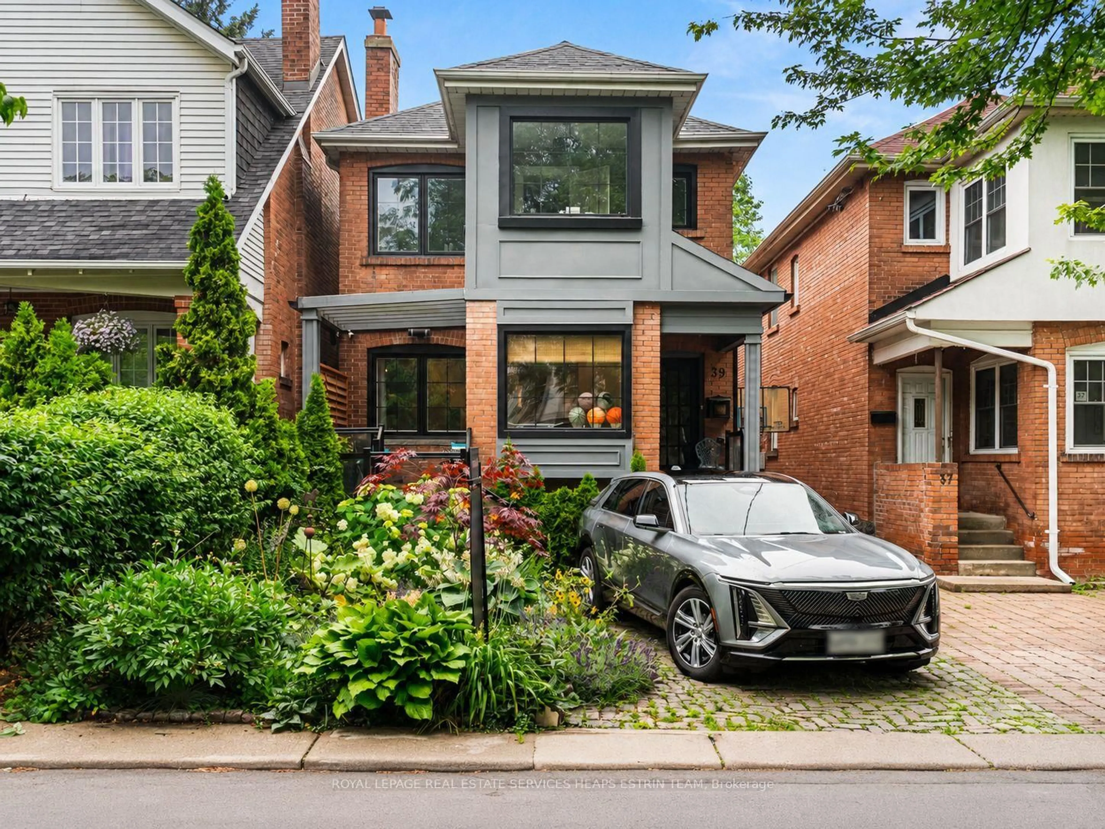 Home with brick exterior material, street for 39 Standish Ave, Toronto Ontario M4W 3B2