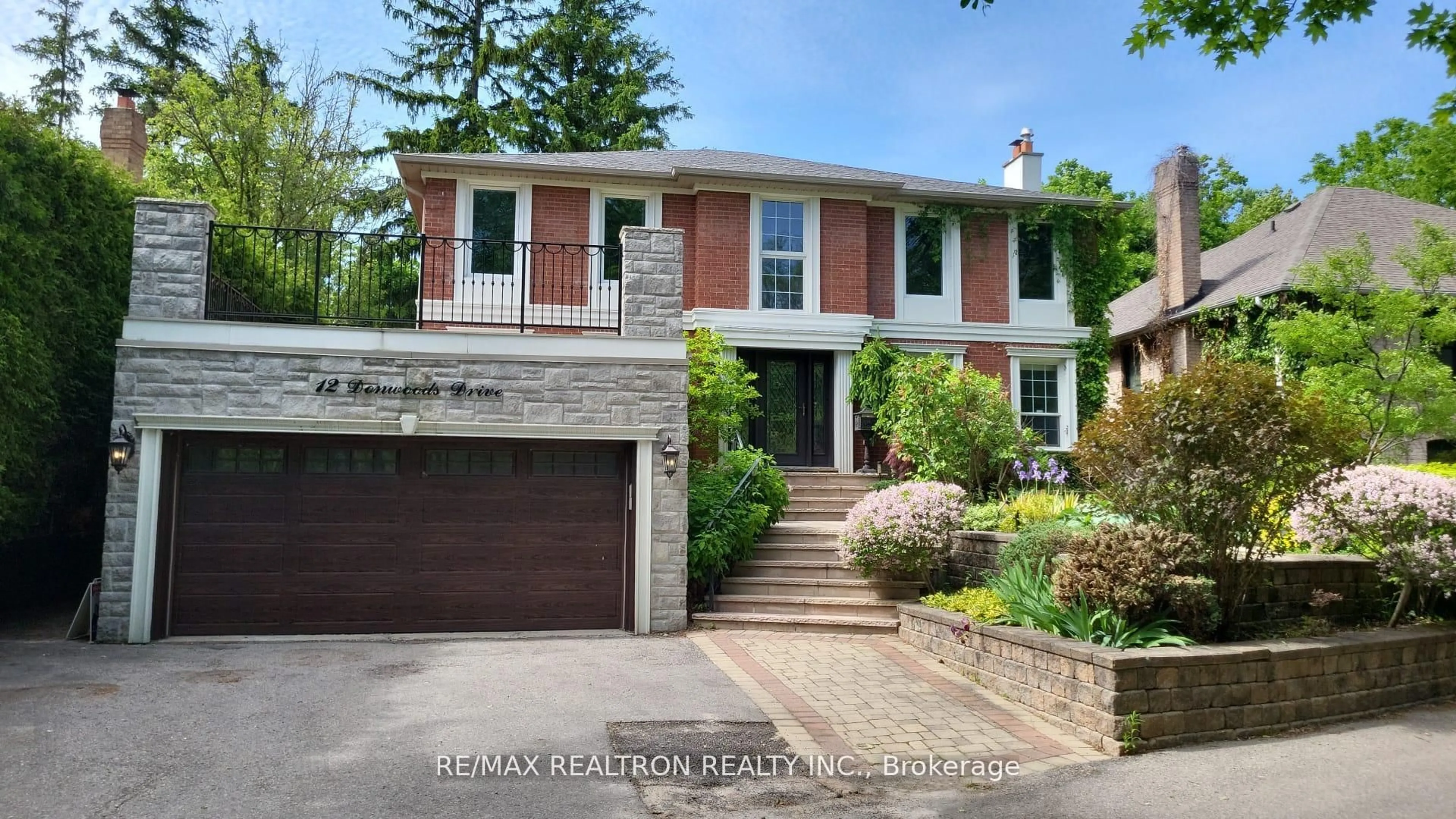 Home with brick exterior material, street for 12 Donwoods Dr, Toronto Ontario M4N 2G1