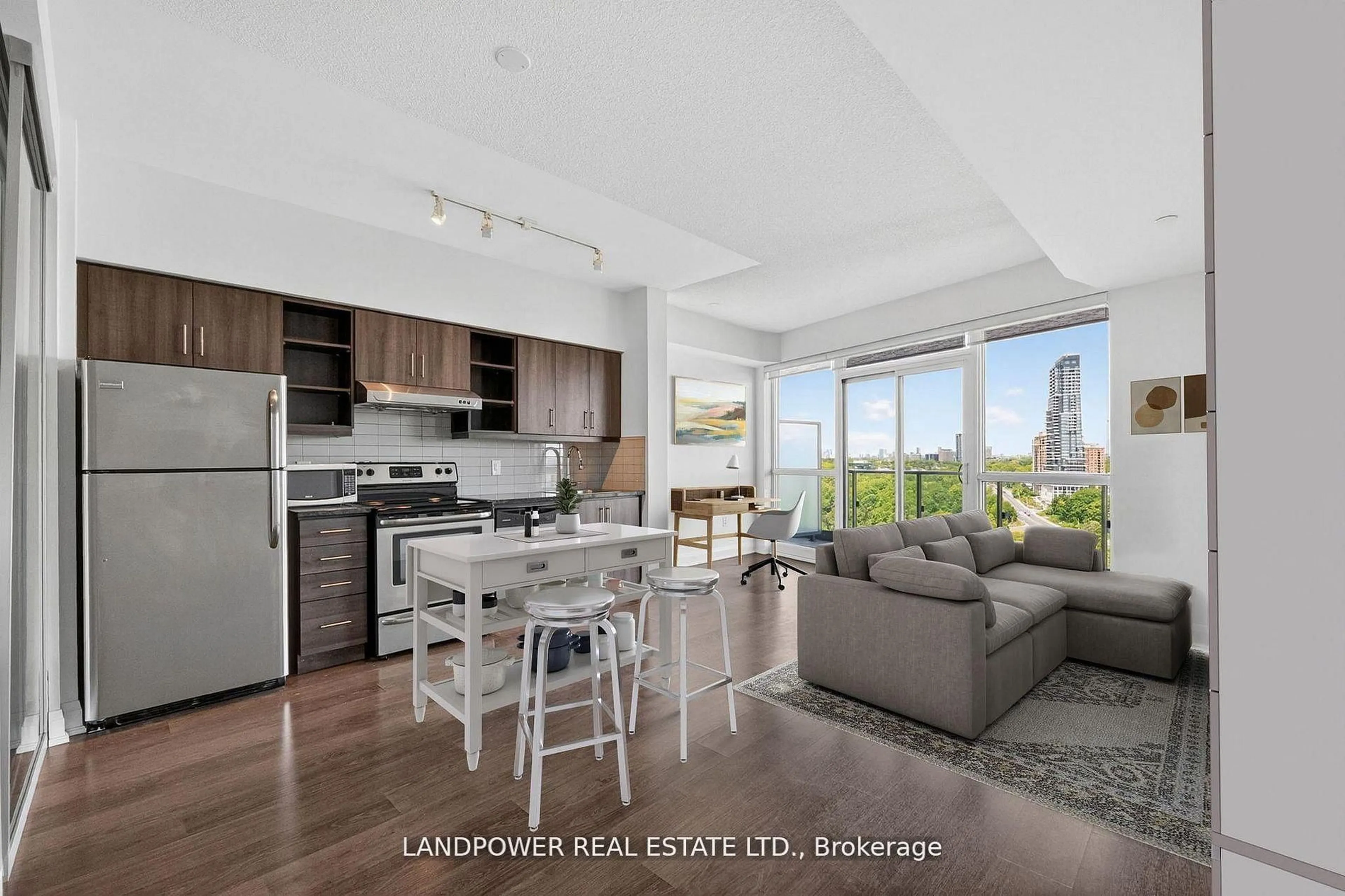Open concept kitchen, wood/laminate floor for 160 Vanderhoof Ave #1203, Toronto Ontario M4G 0B7