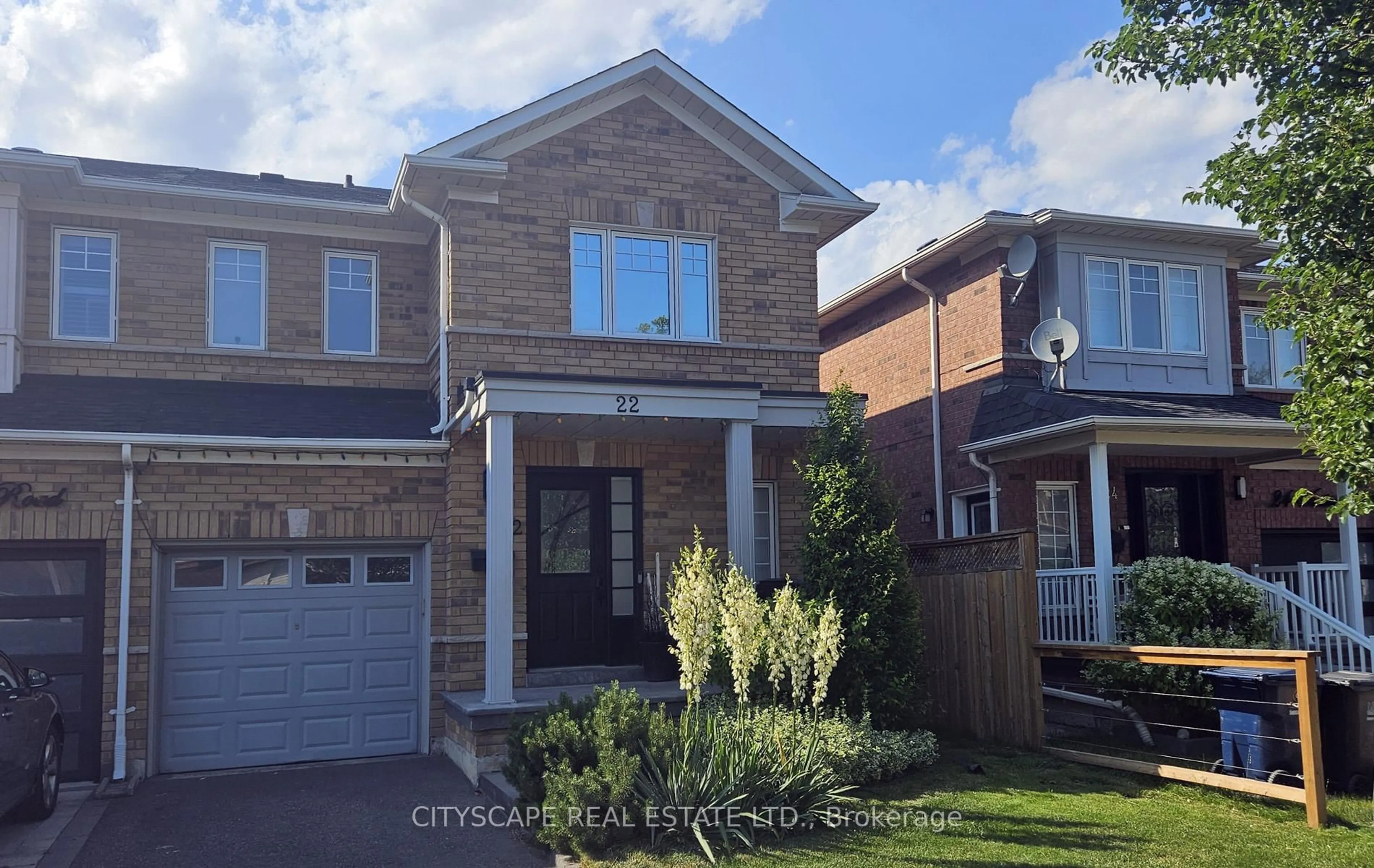 Home with brick exterior material, street for 22 Windom Rd, Toronto Ontario M3C 3Z4