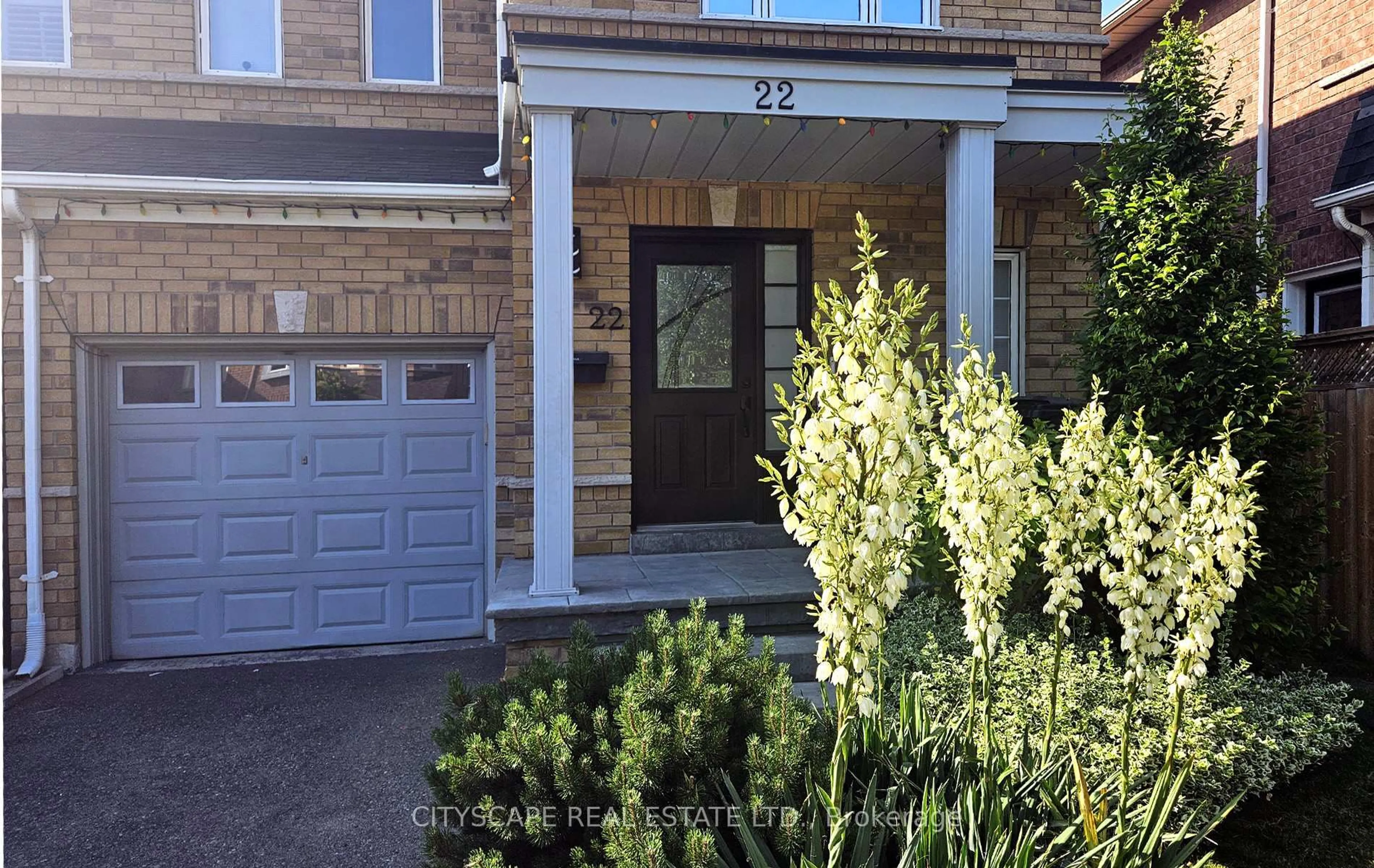 Home with brick exterior material, street for 22 Windom Rd, Toronto Ontario M3C 3Z4