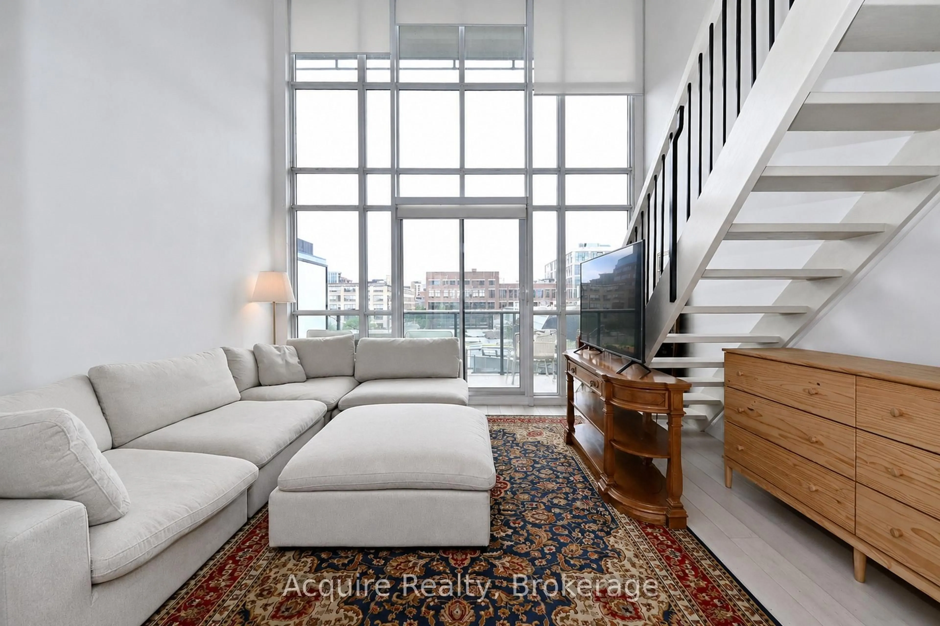 Living room with furniture, unknown for 5 Hanna Ave #413, Toronto Ontario M6K 1W8