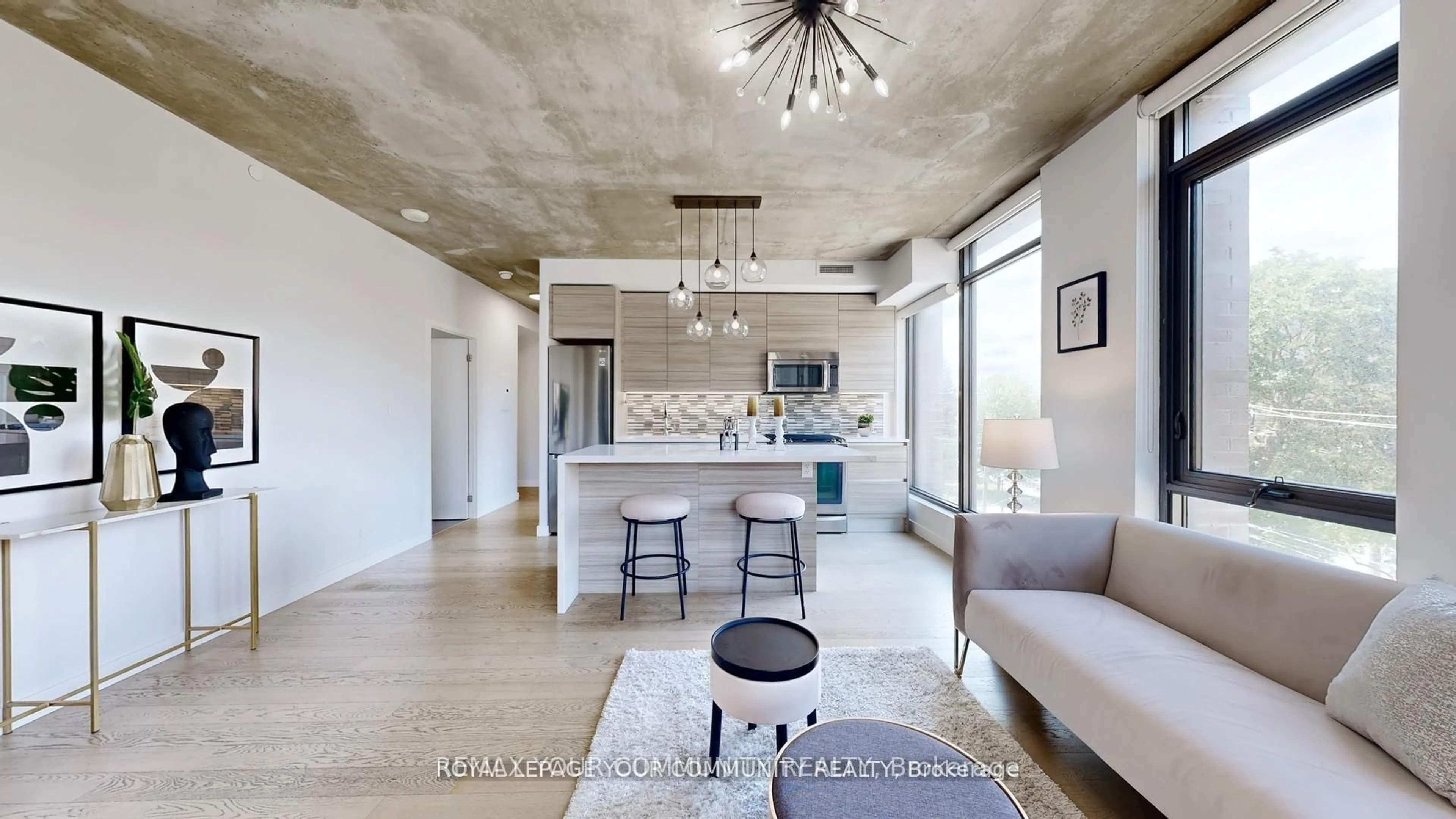 Open concept kitchen, cement floor for 111 Bathurst St #314, Toronto Ontario M5V 0M9