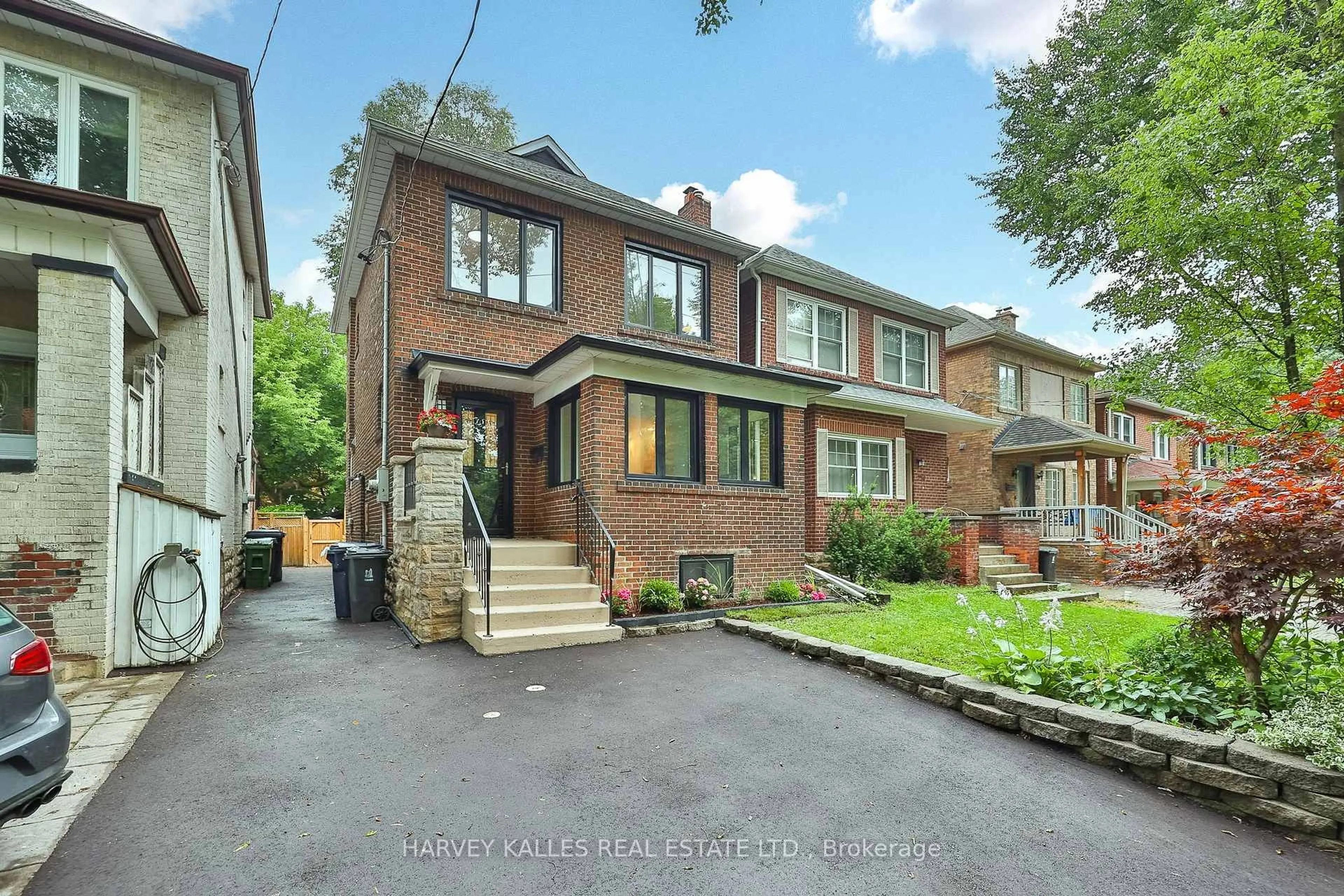 Home with brick exterior material, street for 232 Belsize Dr, Toronto Ontario M4S 1M4