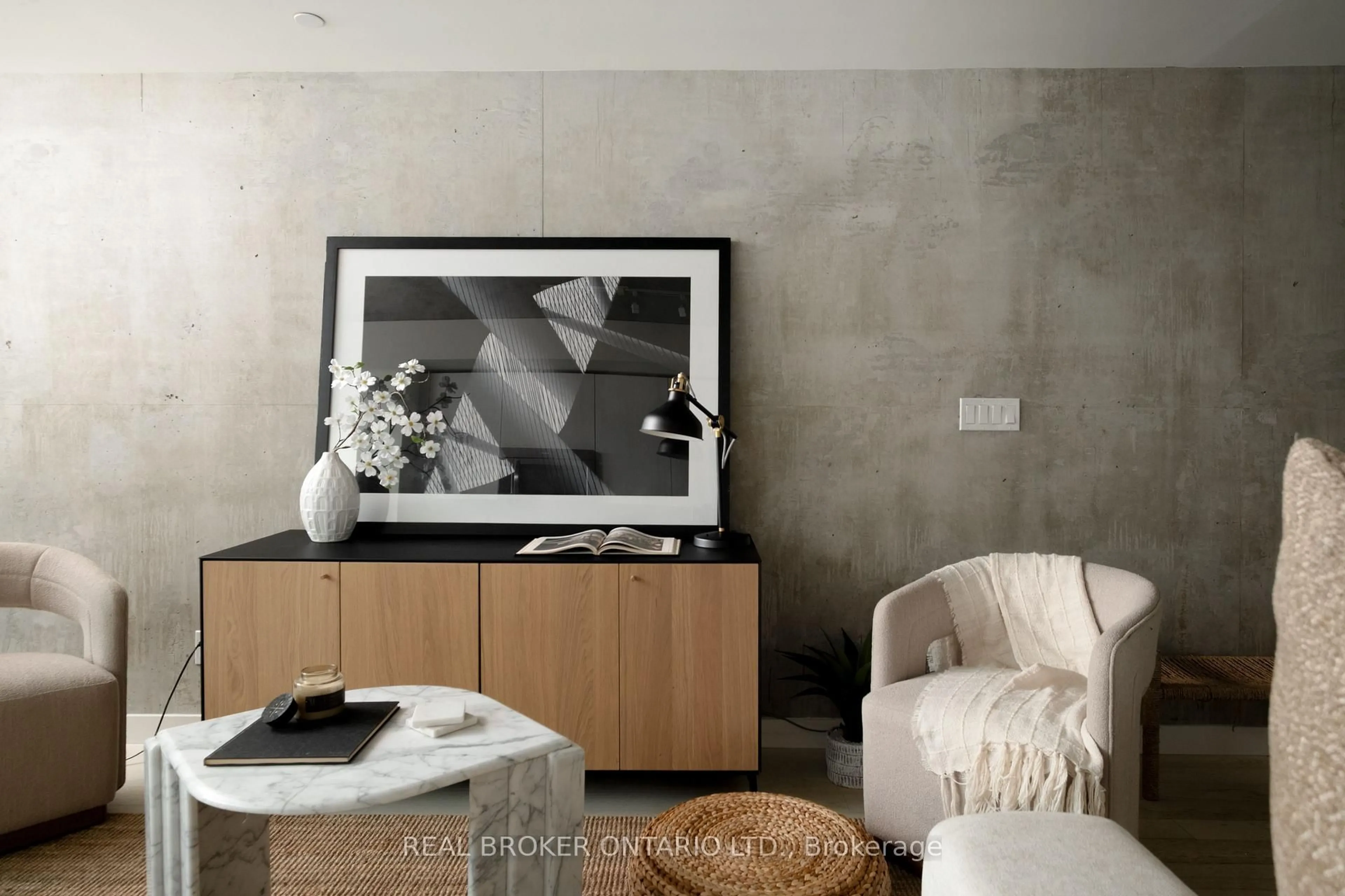 Living room with furniture, cement floor for 111 Bathurst St #508, Toronto Ontario M5V 0M9