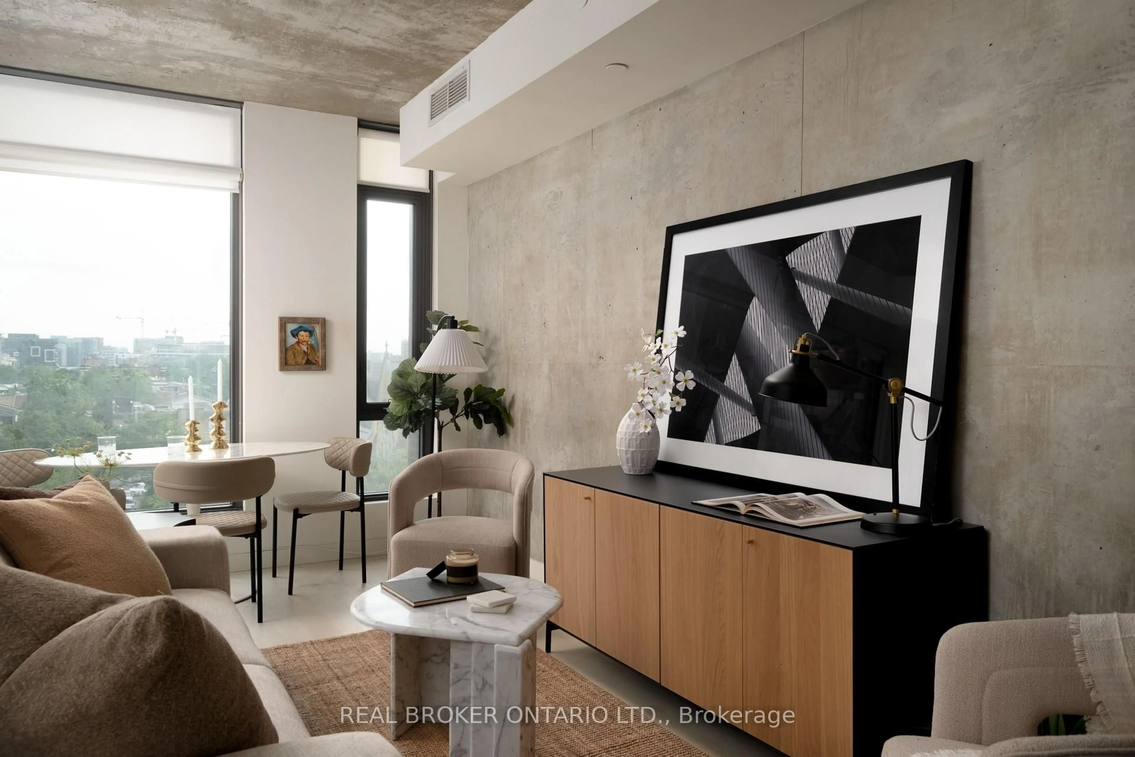 Living room with furniture, cement floor for 111 Bathurst St #508, Toronto Ontario M5V 0M9