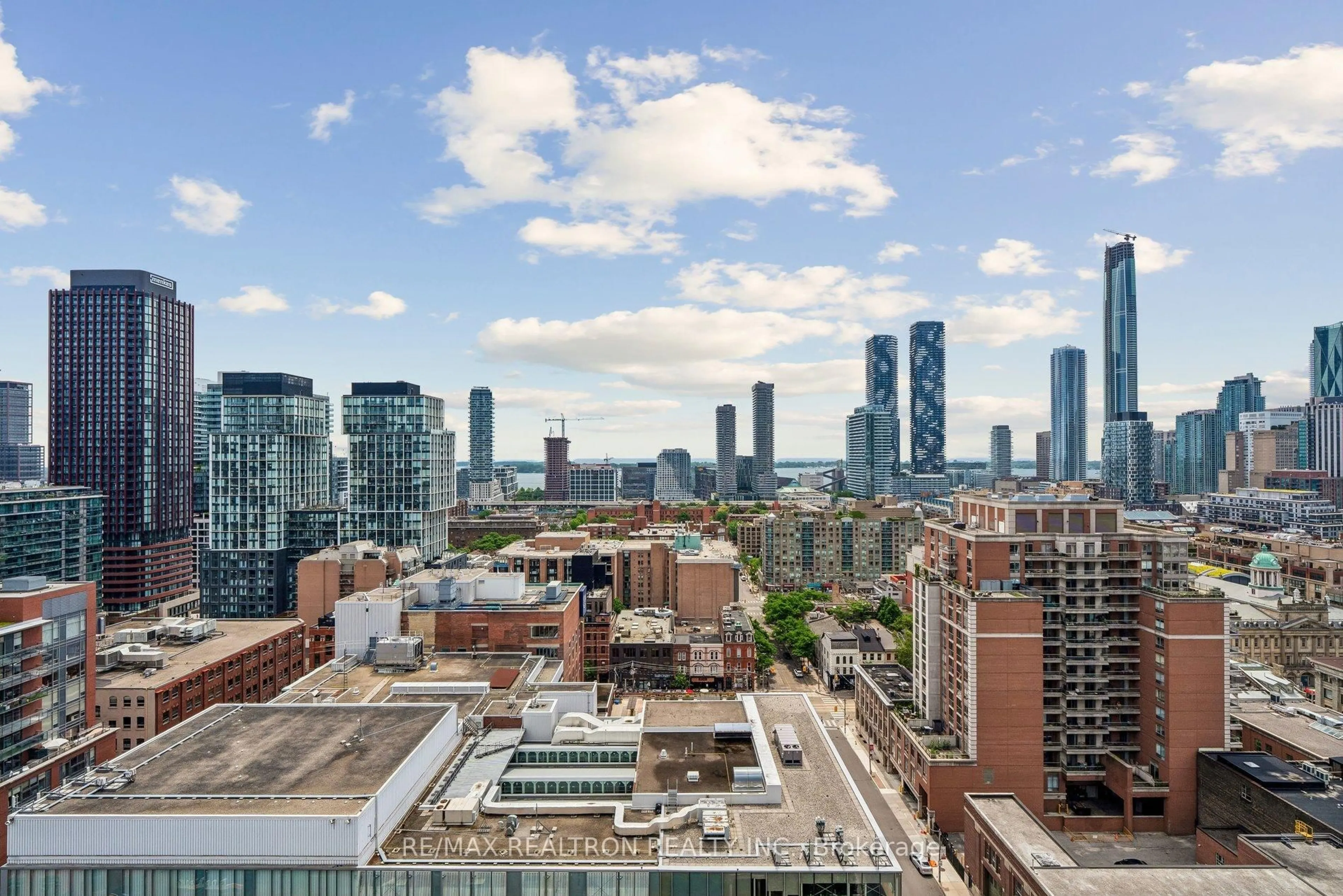 Patio, city buildings view from balcony for 105 George St #1910, Toronto Ontario M5A 0L4