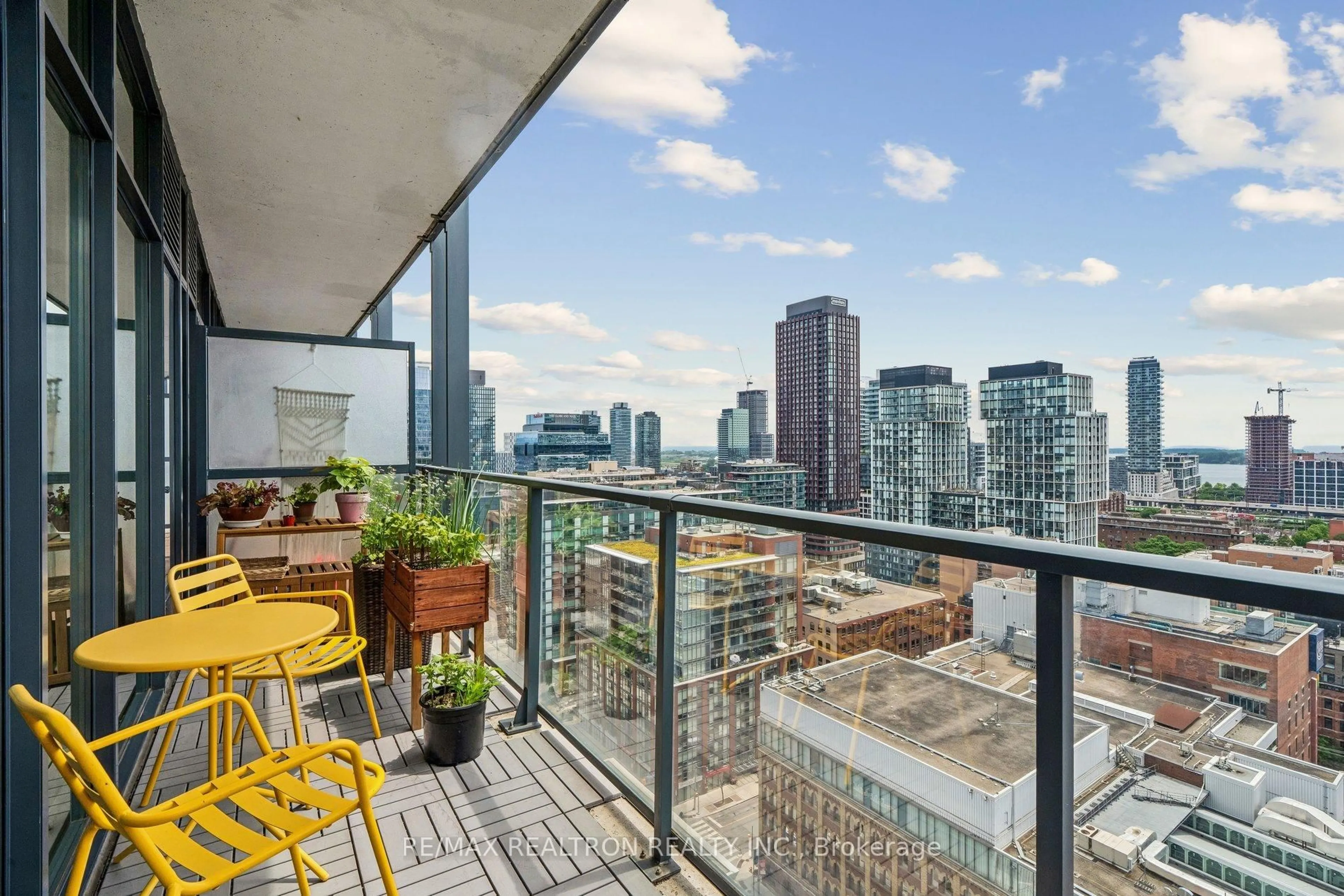 Balcony in the apartment, city buildings view from balcony for 105 George St #1910, Toronto Ontario M5A 0L4