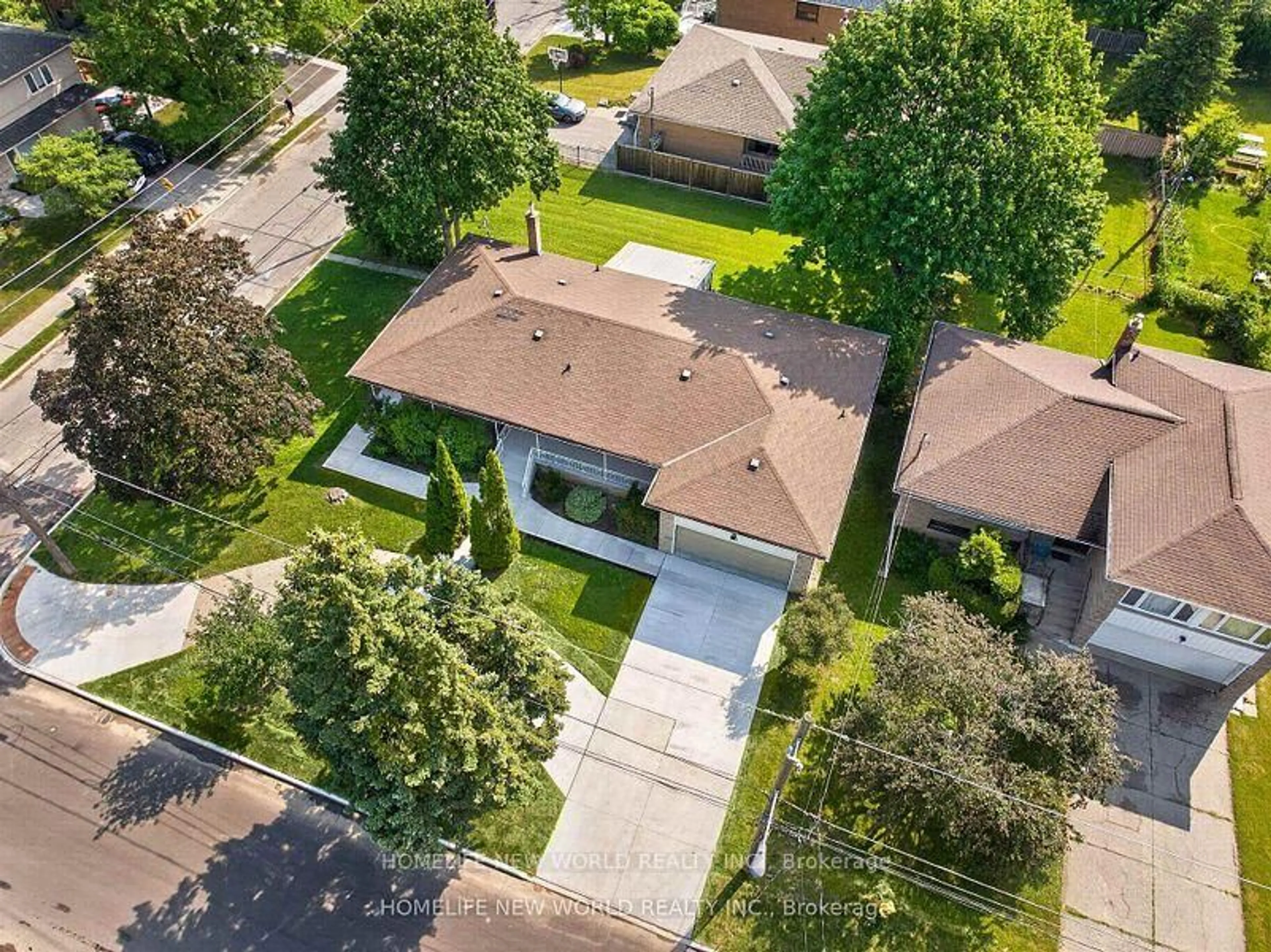 A pic from outside/outdoor area/front of a property/back of a property/a pic from drone, street for 203 Goddard St, Toronto Ontario M3H 5E7