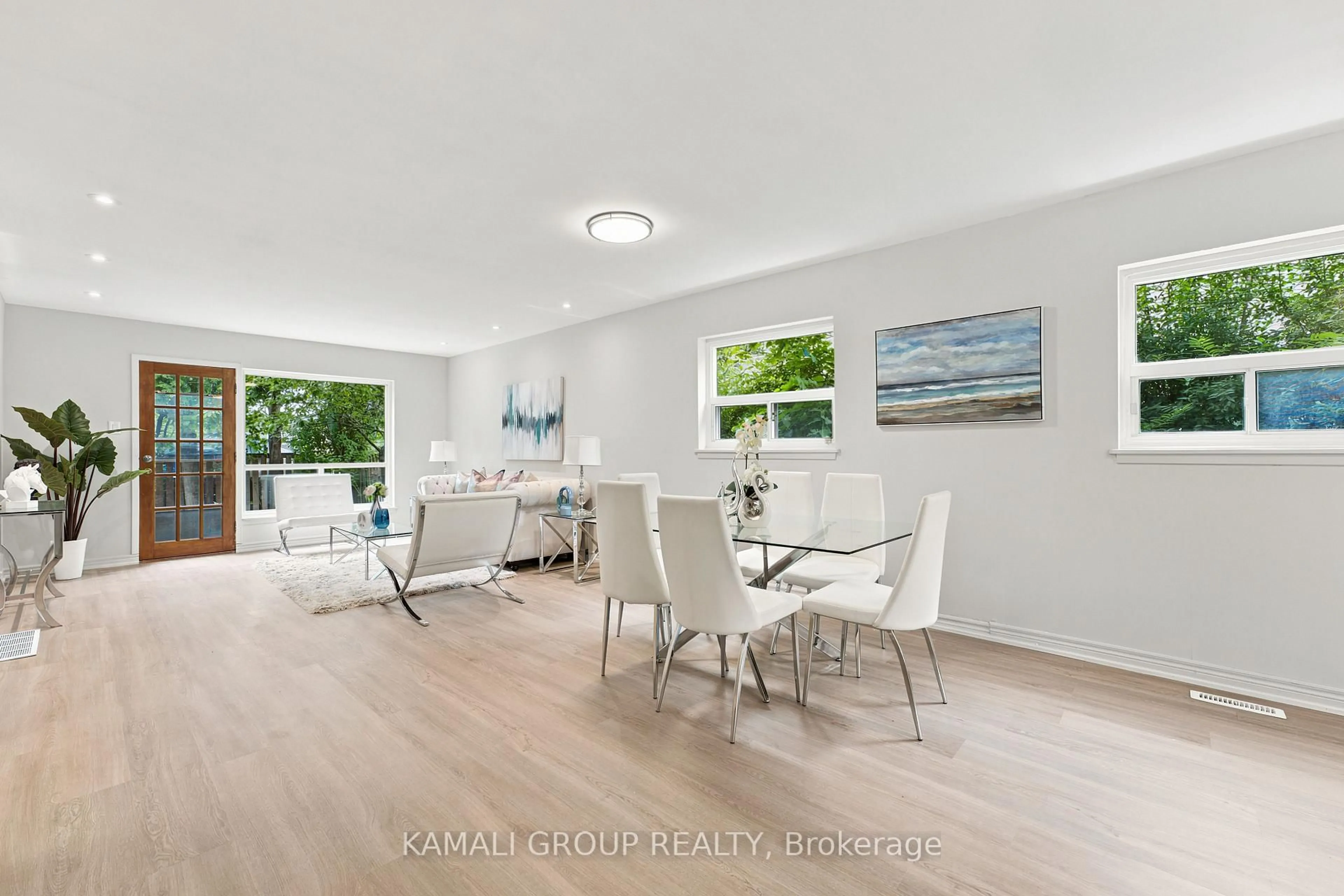 Dining room, wood/laminate floor for 23 Greenwin Village Rd, Toronto Ontario M2R 2R9