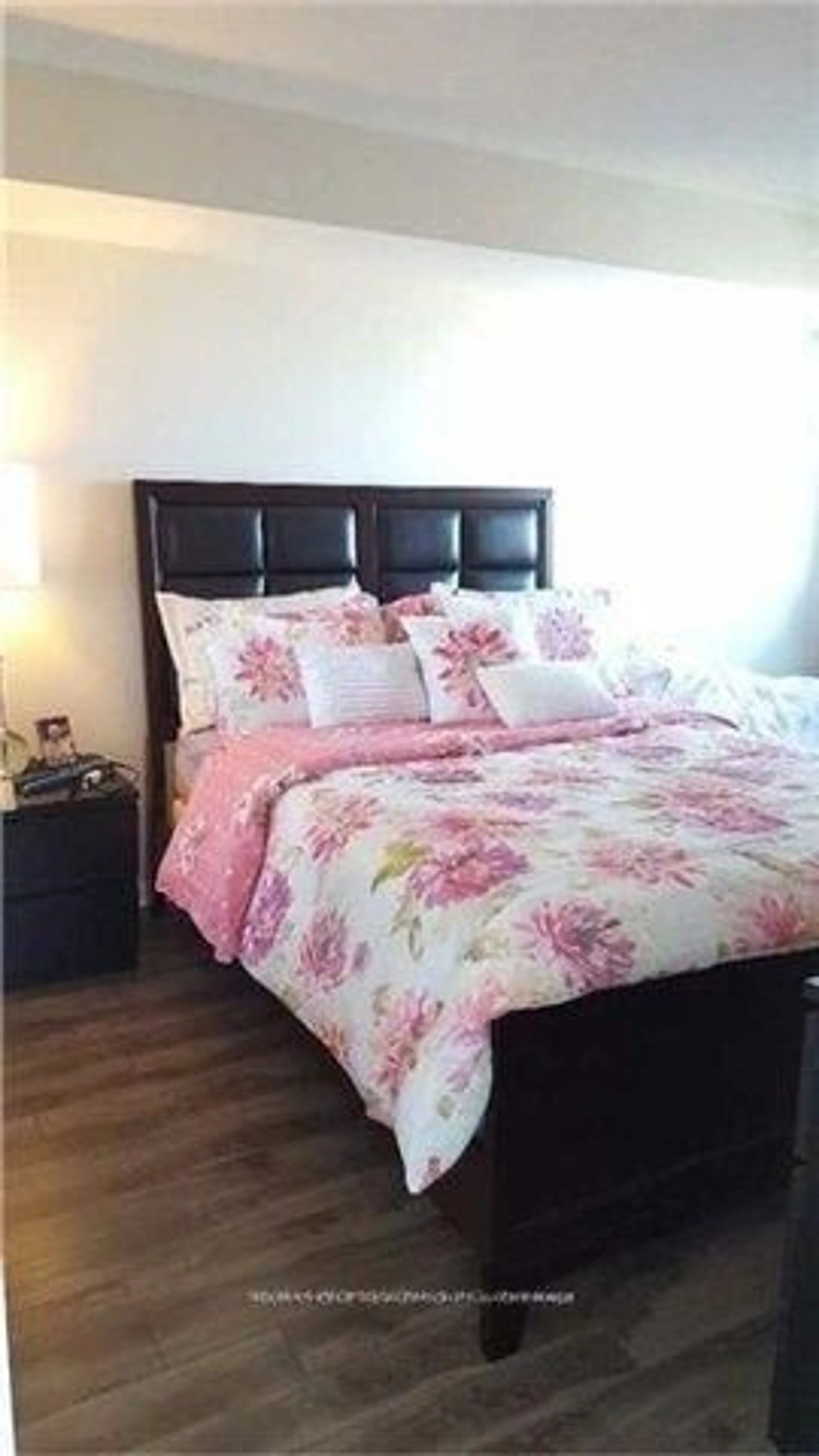 Bedroom with bed, wood/laminate floor for 18 Yonge St #1311, Toronto Ontario M5E 1Z8