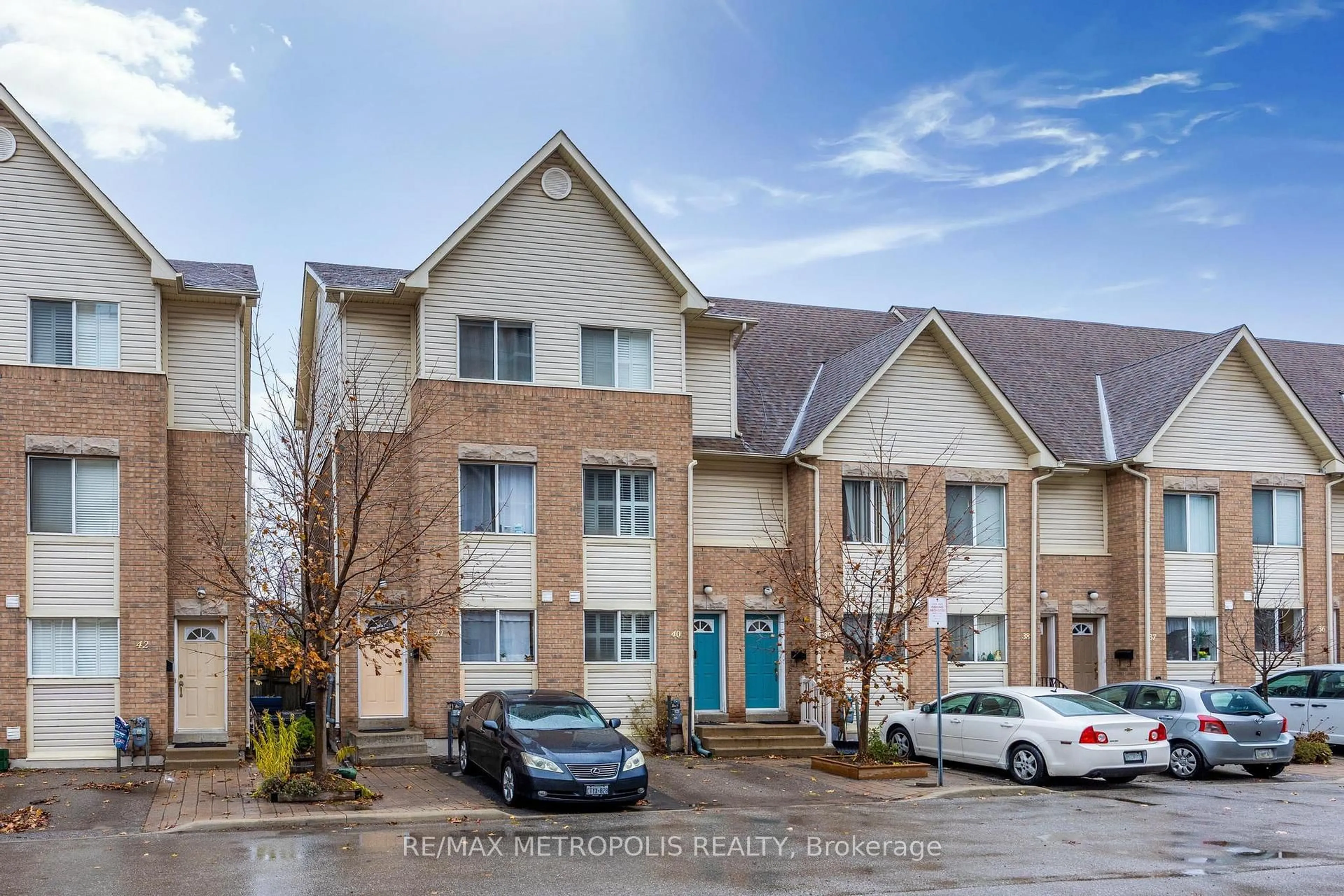 A pic from outside/outdoor area/front of a property/back of a property/a pic from drone, street for 21 Replin Rd #40, Toronto Ontario M6A 2M8