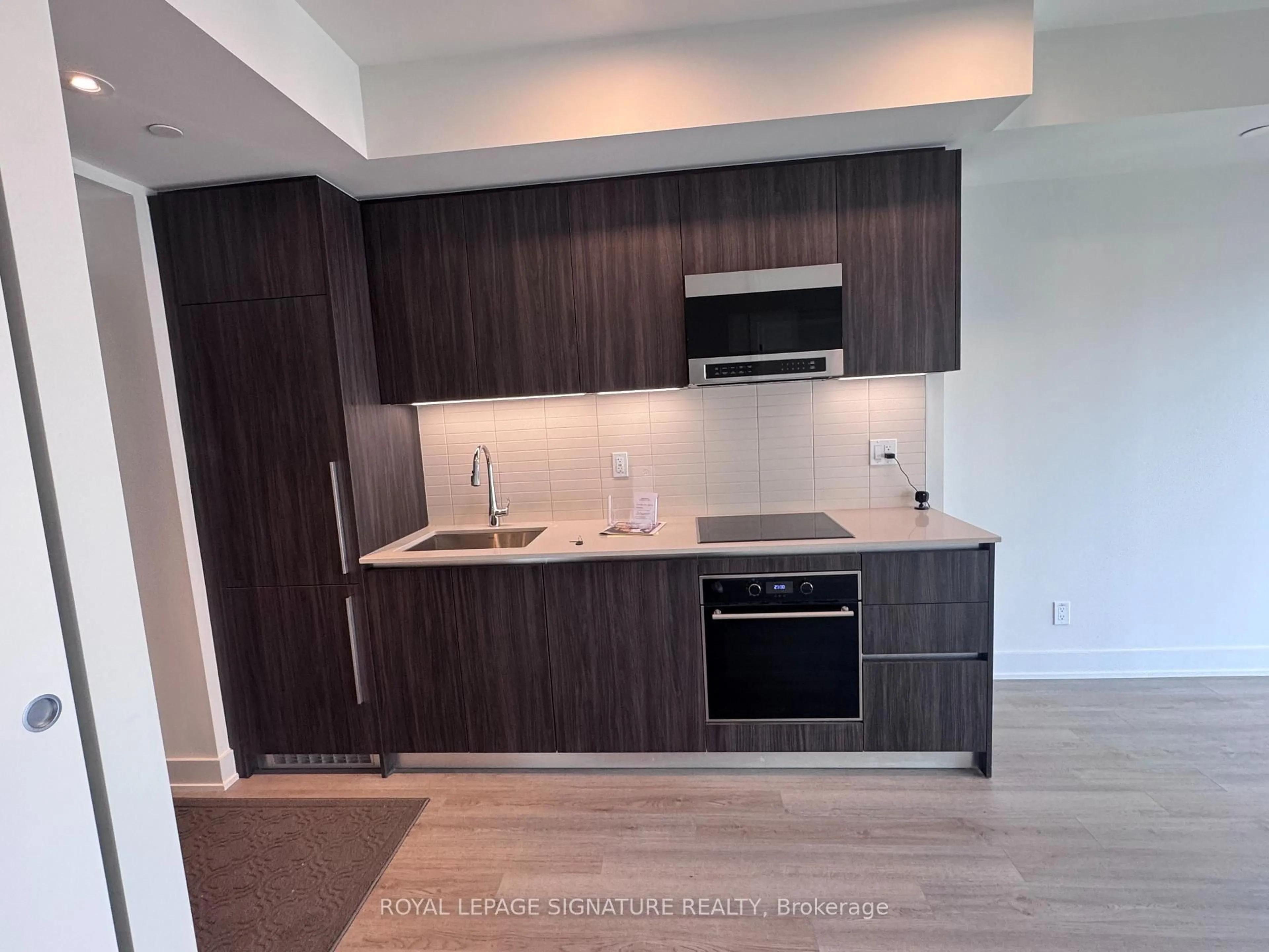 Standard kitchen, wood/laminate floor for 8 Cumberland St #2801, Toronto Ontario M4W 0B6