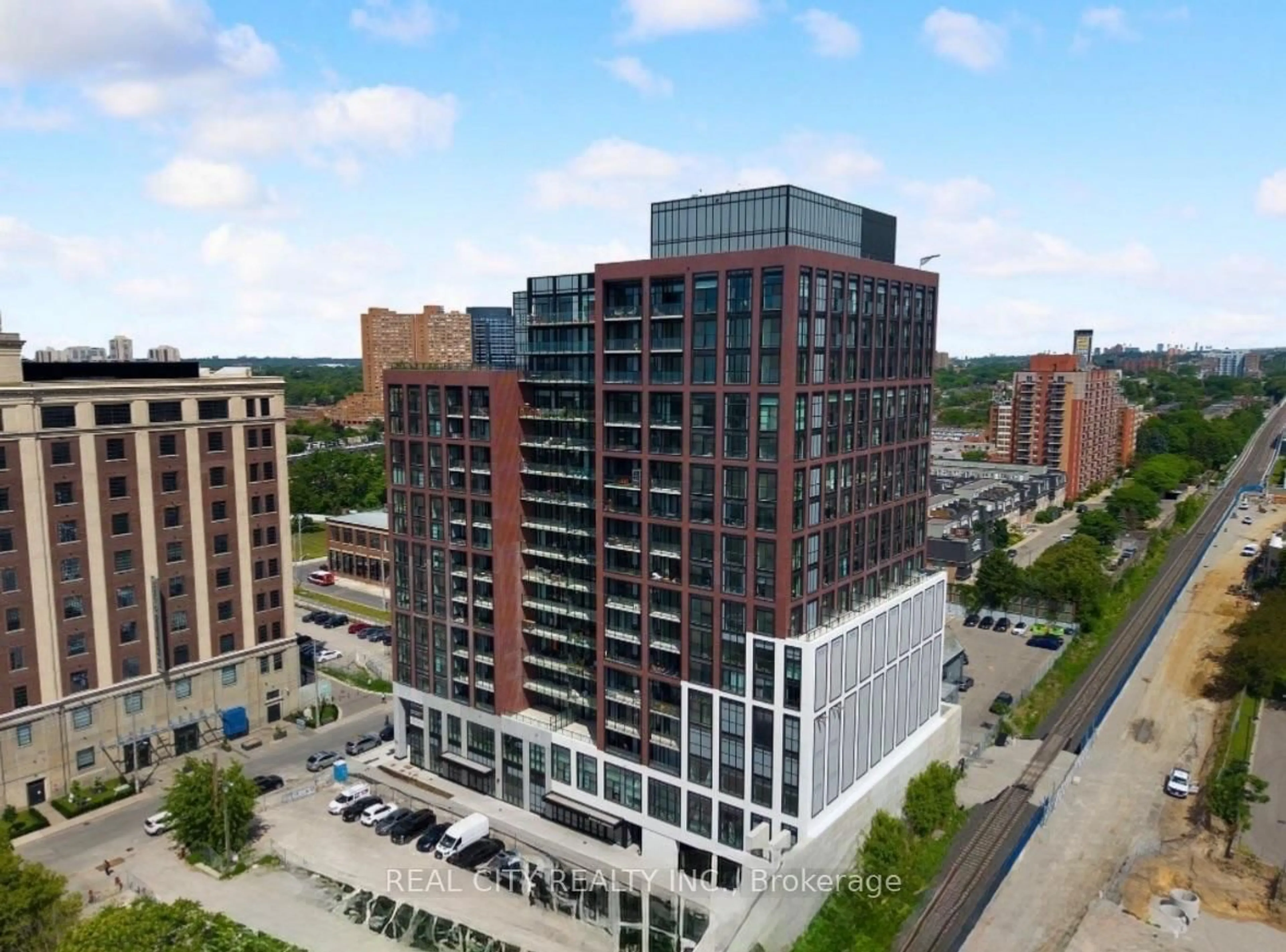 A pic from outside/outdoor area/front of a property/back of a property/a pic from drone, city buildings view from balcony for 181 Sterling Rd #701, Toronto Ontario M6R 2B2
