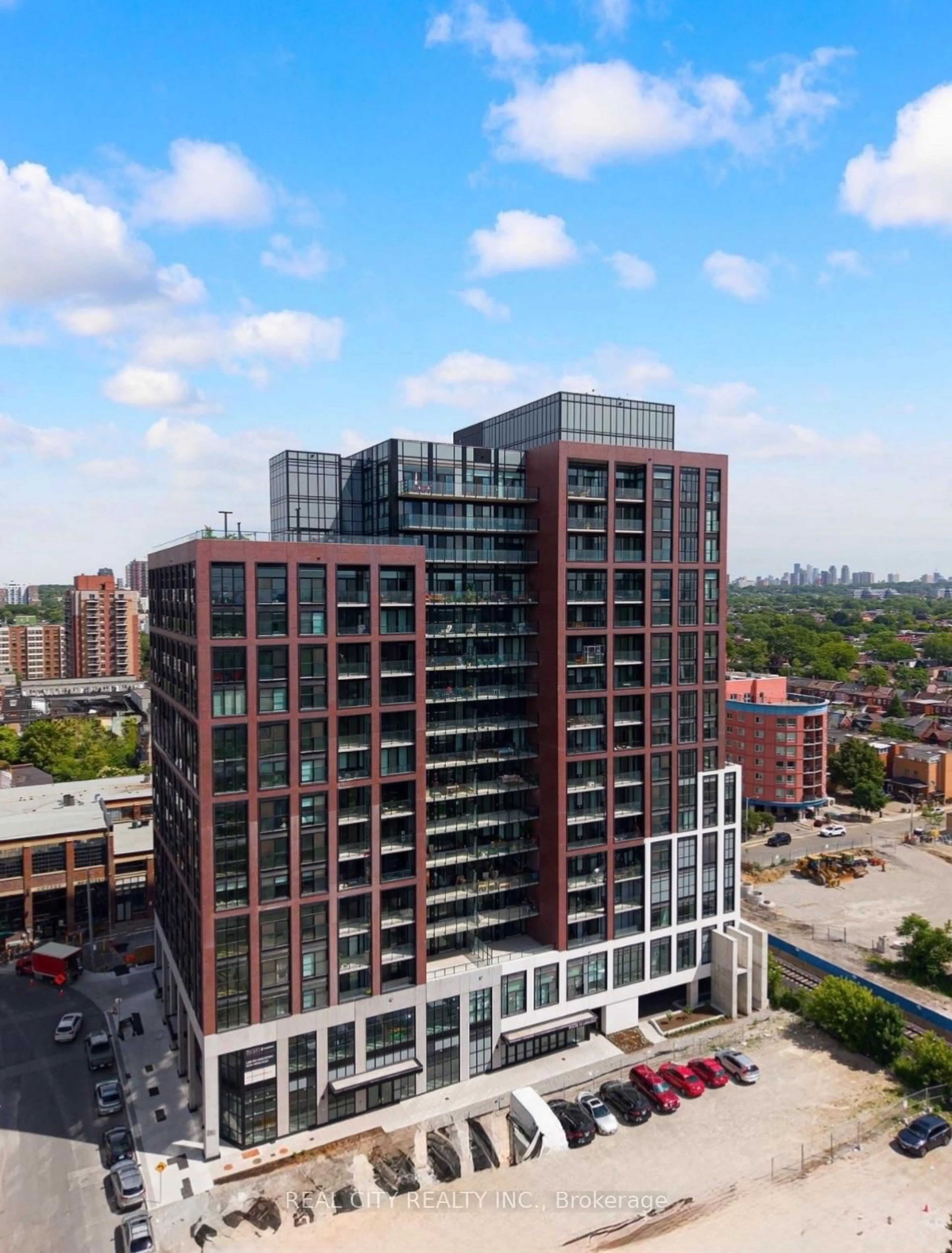A pic from outside/outdoor area/front of a property/back of a property/a pic from drone, city buildings view from balcony for 181 Sterling Rd #701, Toronto Ontario M6R 2B2