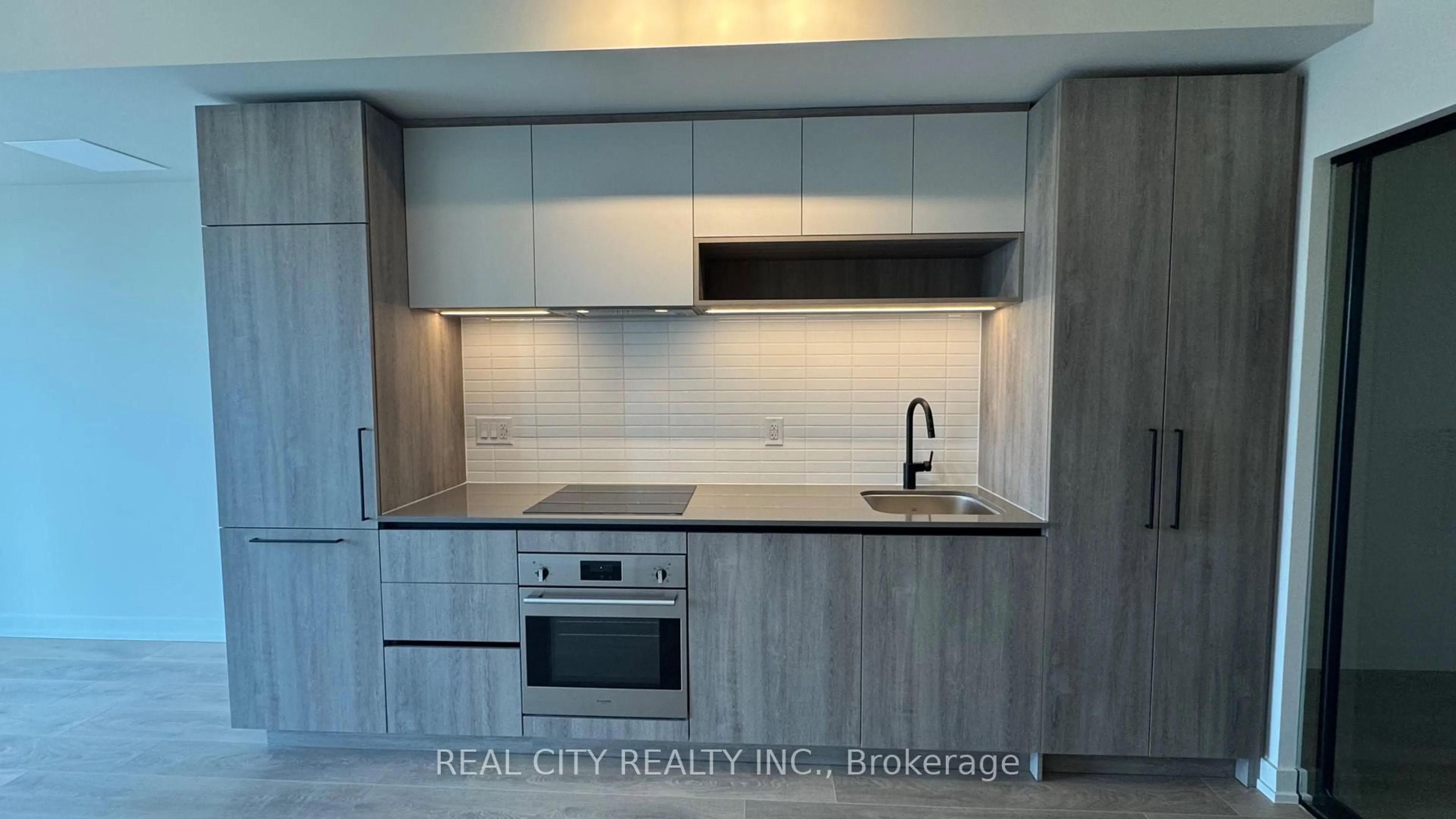 Standard kitchen, wood/laminate floor for 181 Sterling Rd #701, Toronto Ontario M6R 2B2