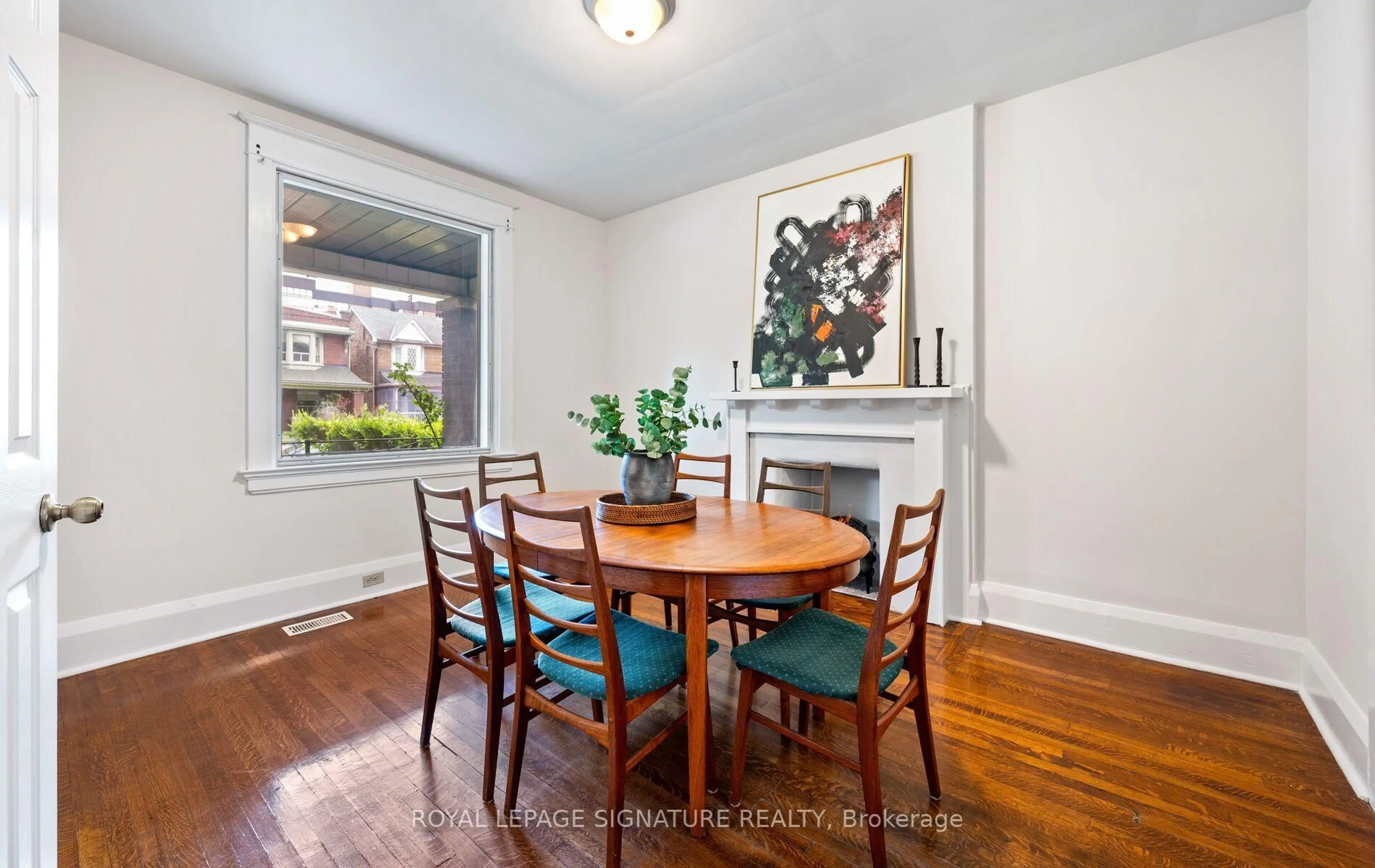 Dining room, wood/laminate floor for 222 Melita Ave, Toronto Ontario M6G 2A2