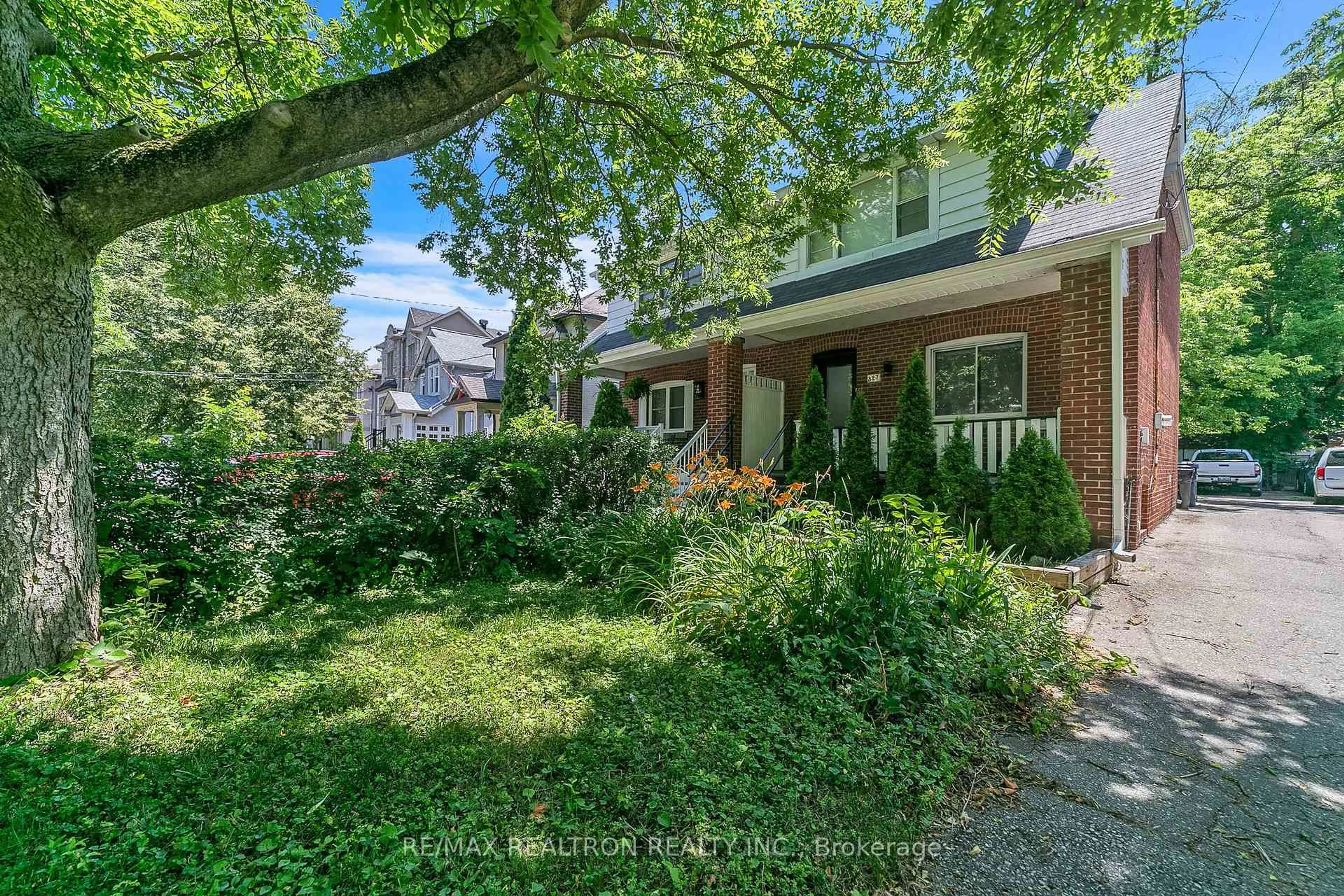 Home with brick exterior material, street for 327 Deloraine Ave, Toronto Ontario M5M 2B4