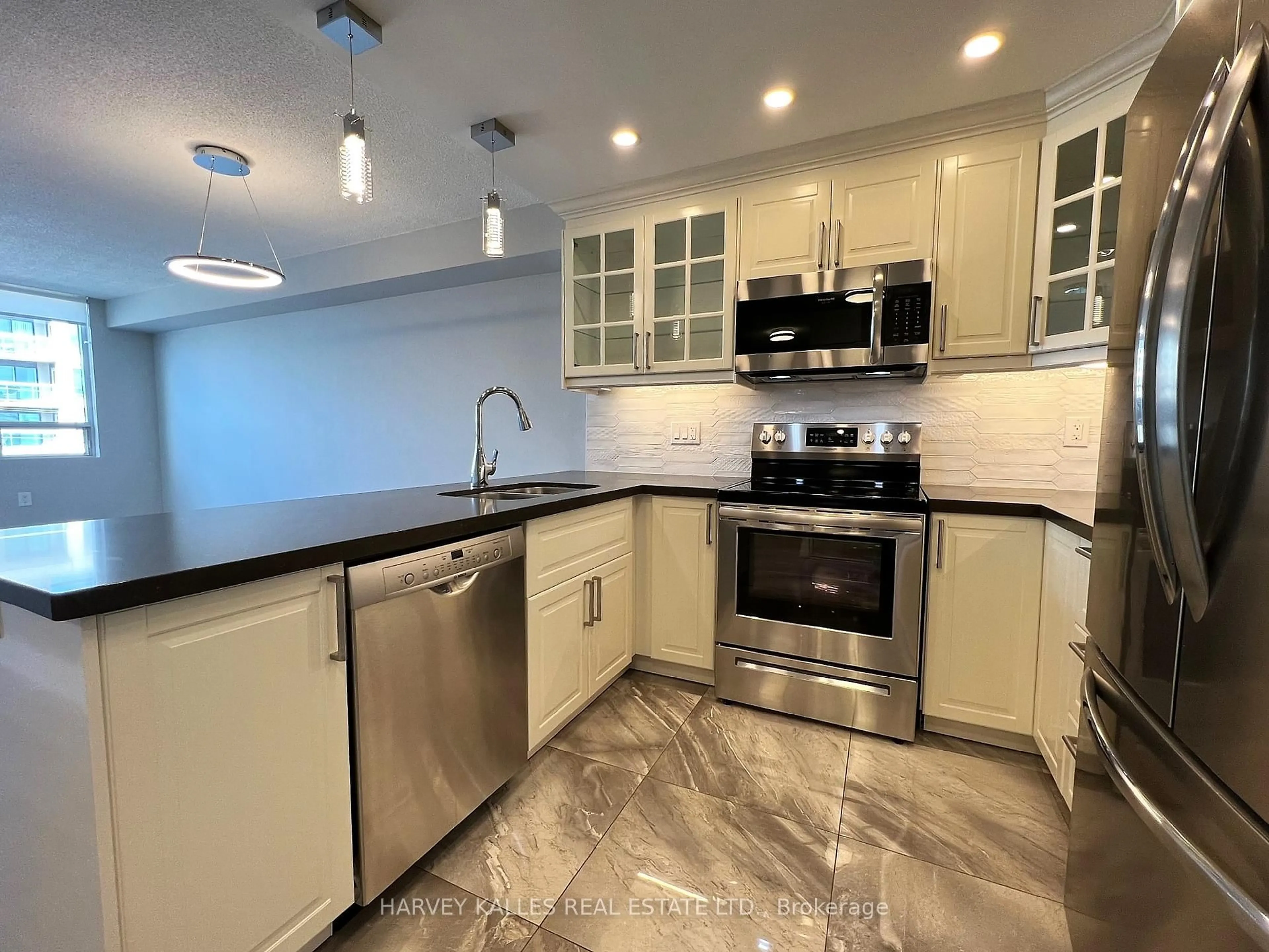Open concept kitchen, ceramic/tile floor for 555 Wilson Heights Blvd #410, Toronto Ontario M3H 6B5