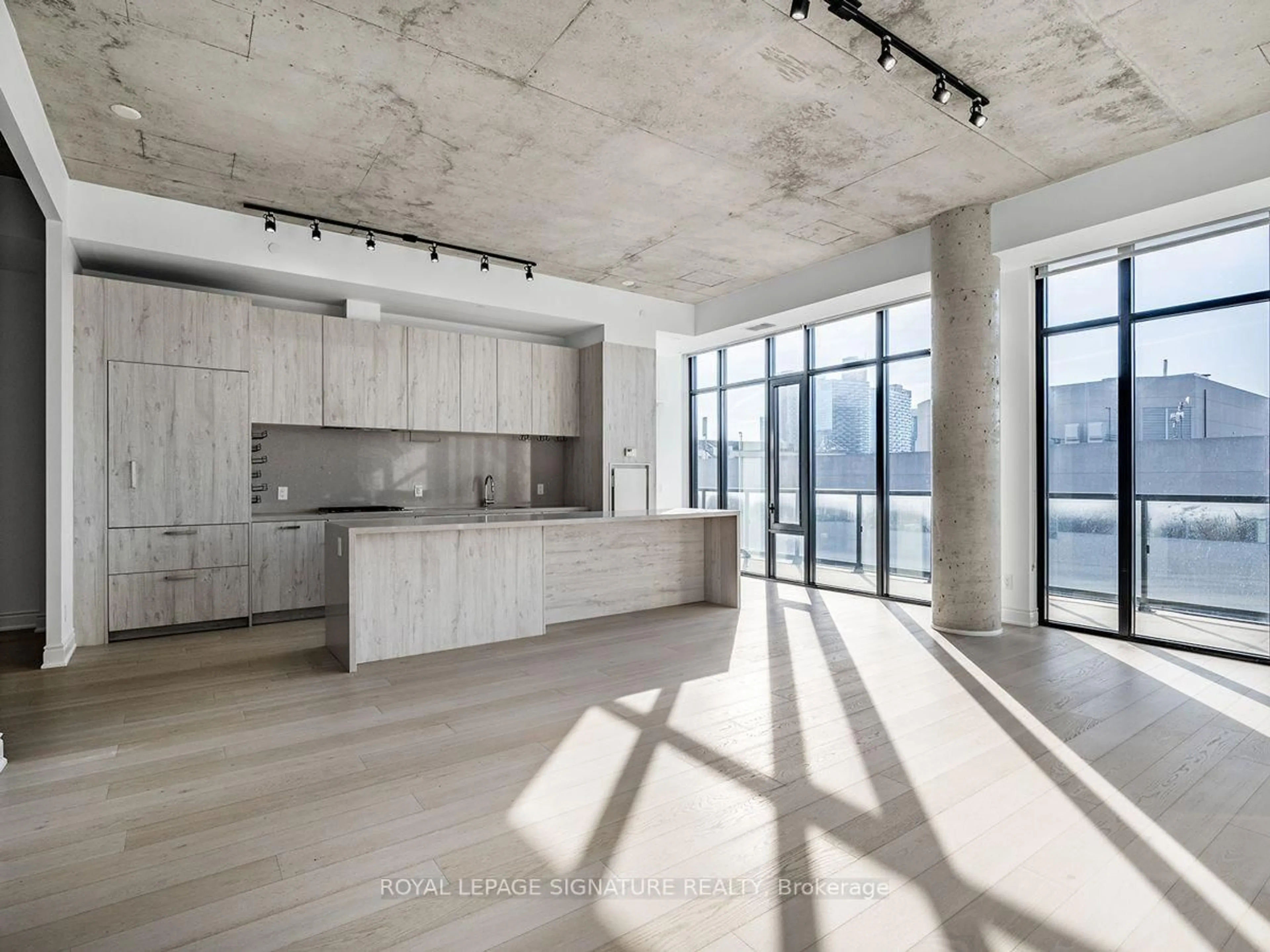 Open concept kitchen, cement floor for 608 Richmond St #1402, Toronto Ontario M5V 1Y9