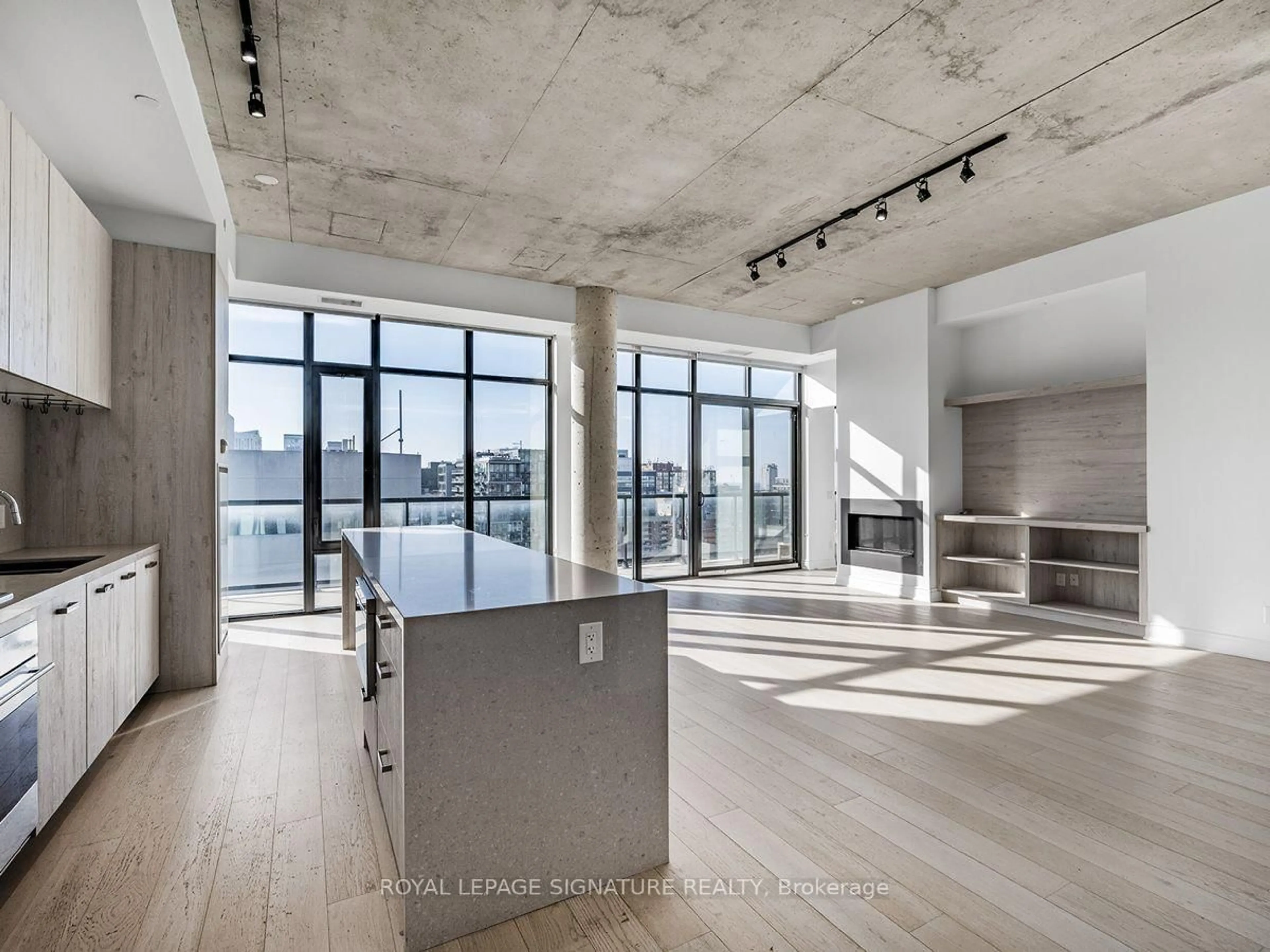 Open concept kitchen, cement floor for 608 Richmond St #1402, Toronto Ontario M5V 1Y9