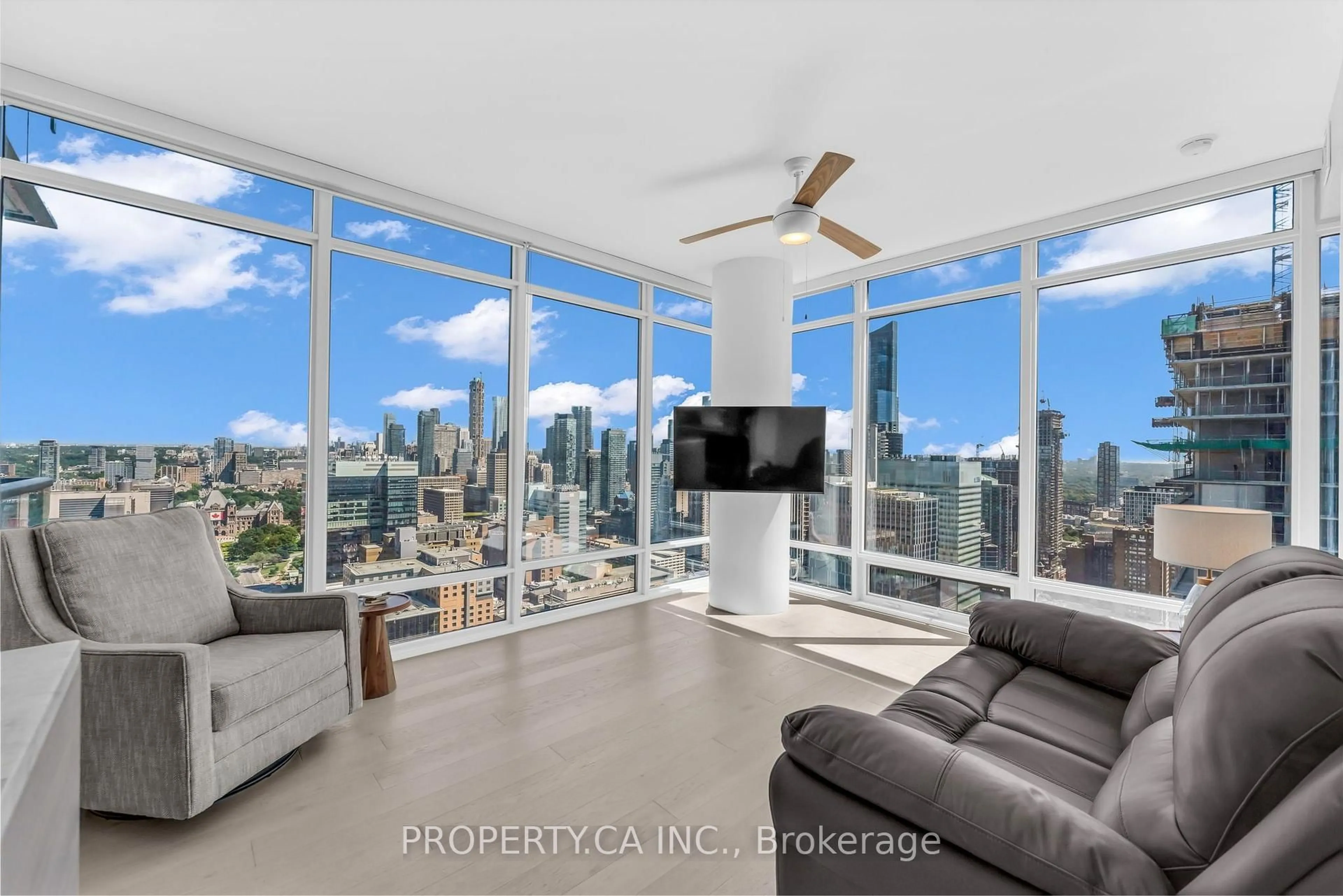 Living room with furniture, unknown for 488 University Ave #3002, Toronto Ontario M5G 0C1