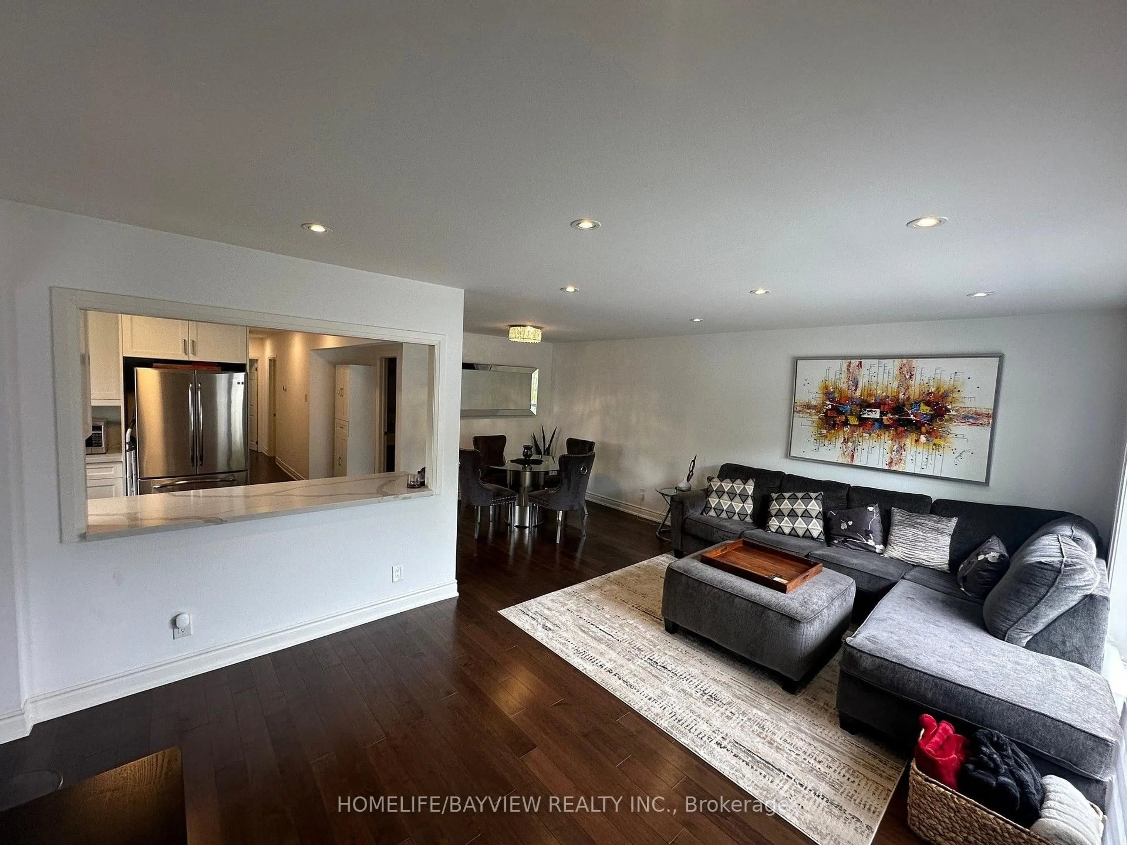 Living room with furniture, unknown for 68 Knighton Dr, Toronto Ontario M4A 1W2