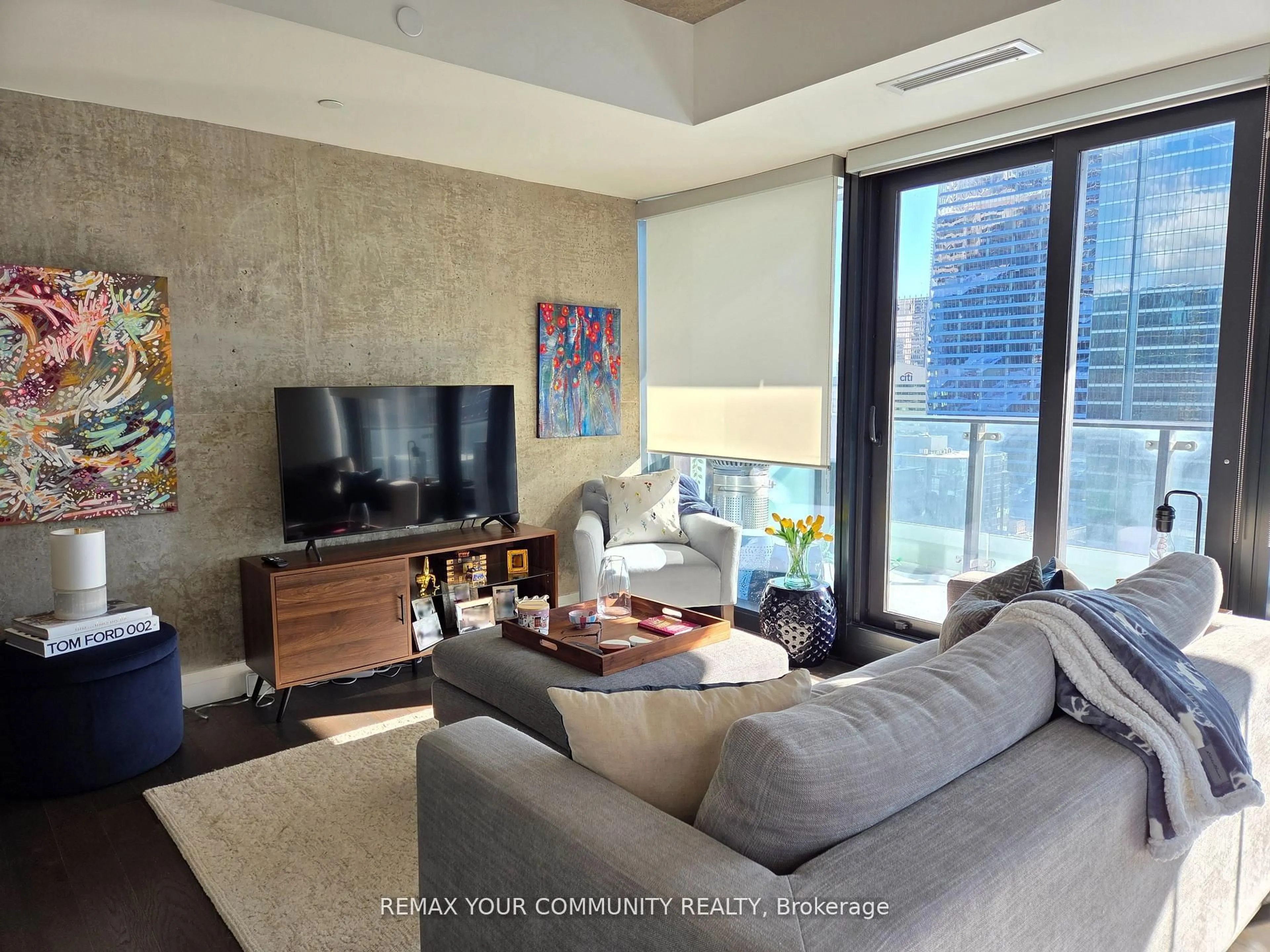 Living room with furniture, cement floor for 224 King St #2107, Toronto Ontario M5V 1H8