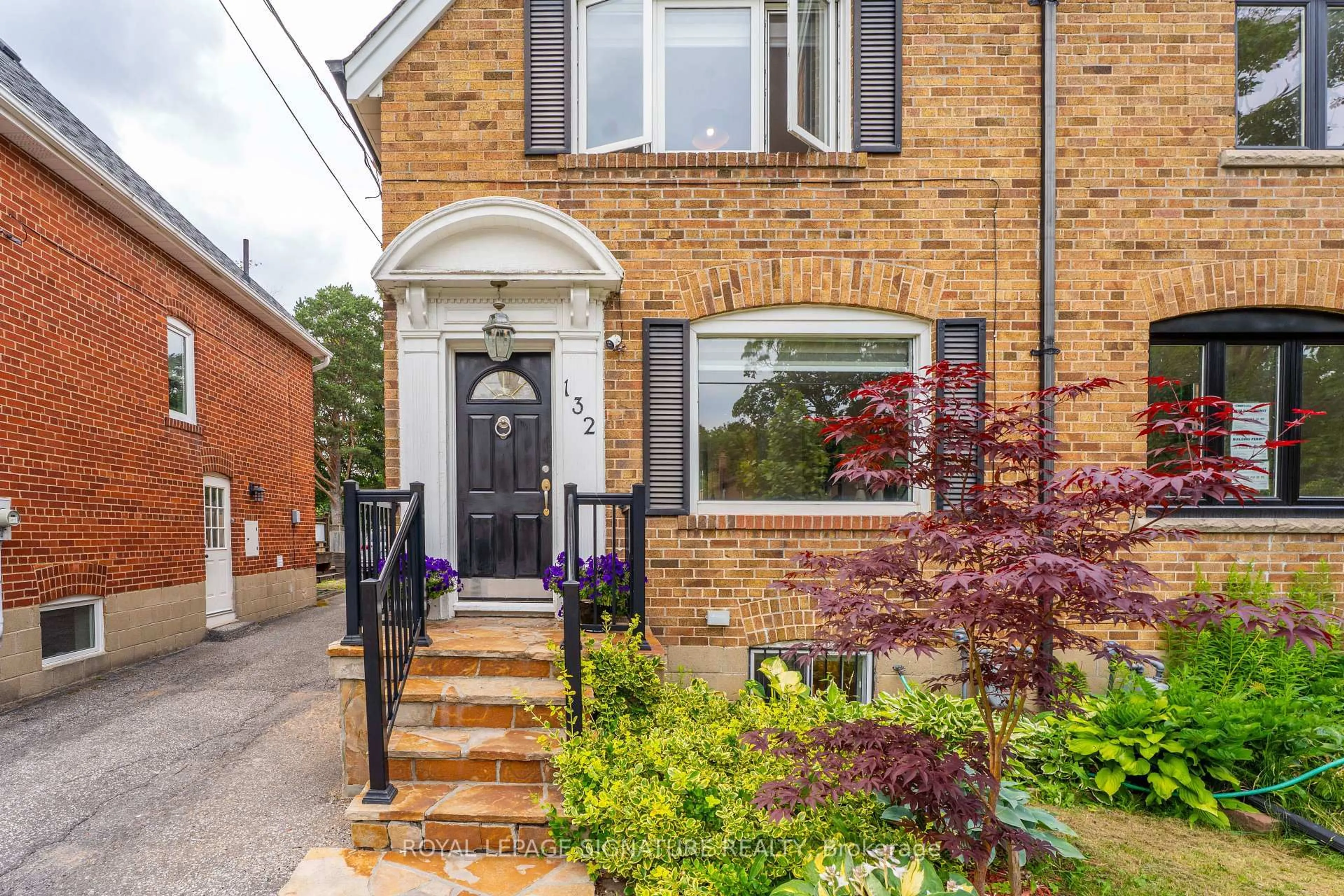 Home with brick exterior material, street for 132 Glenvale Blvd, Toronto Ontario M4G 2V9