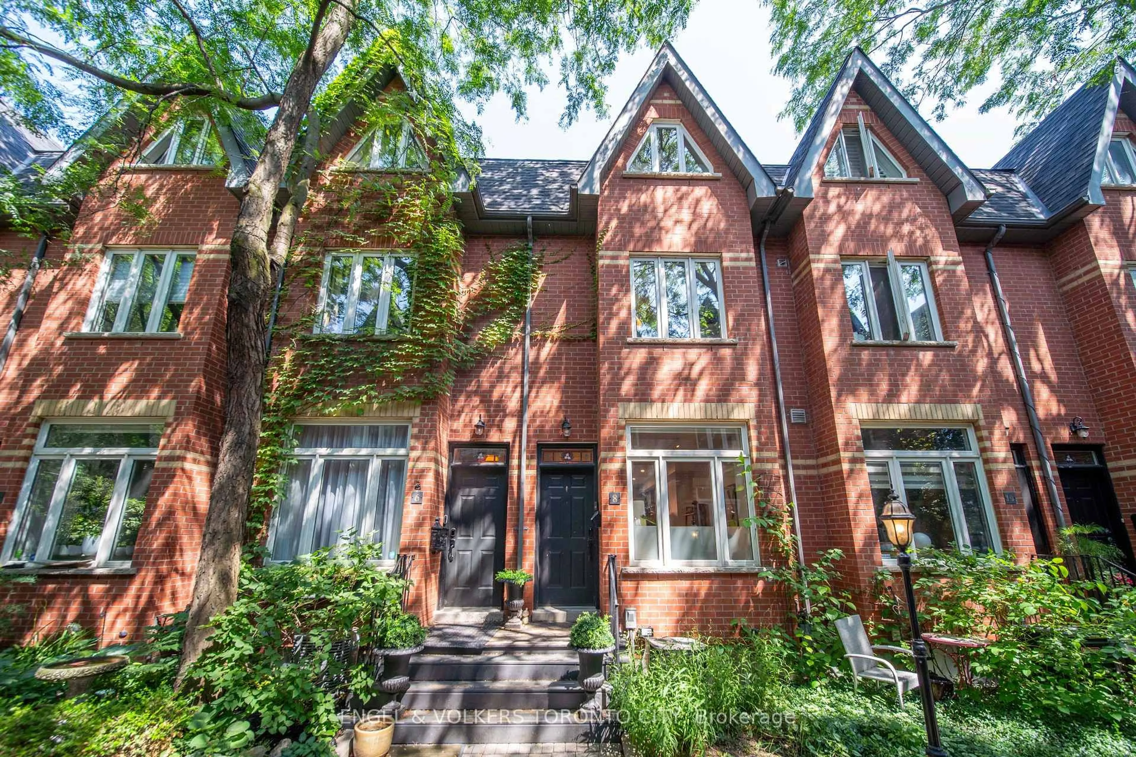 Home with brick exterior material, street for 8 Old Trillium Lane, Toronto Ontario M5A 4T2