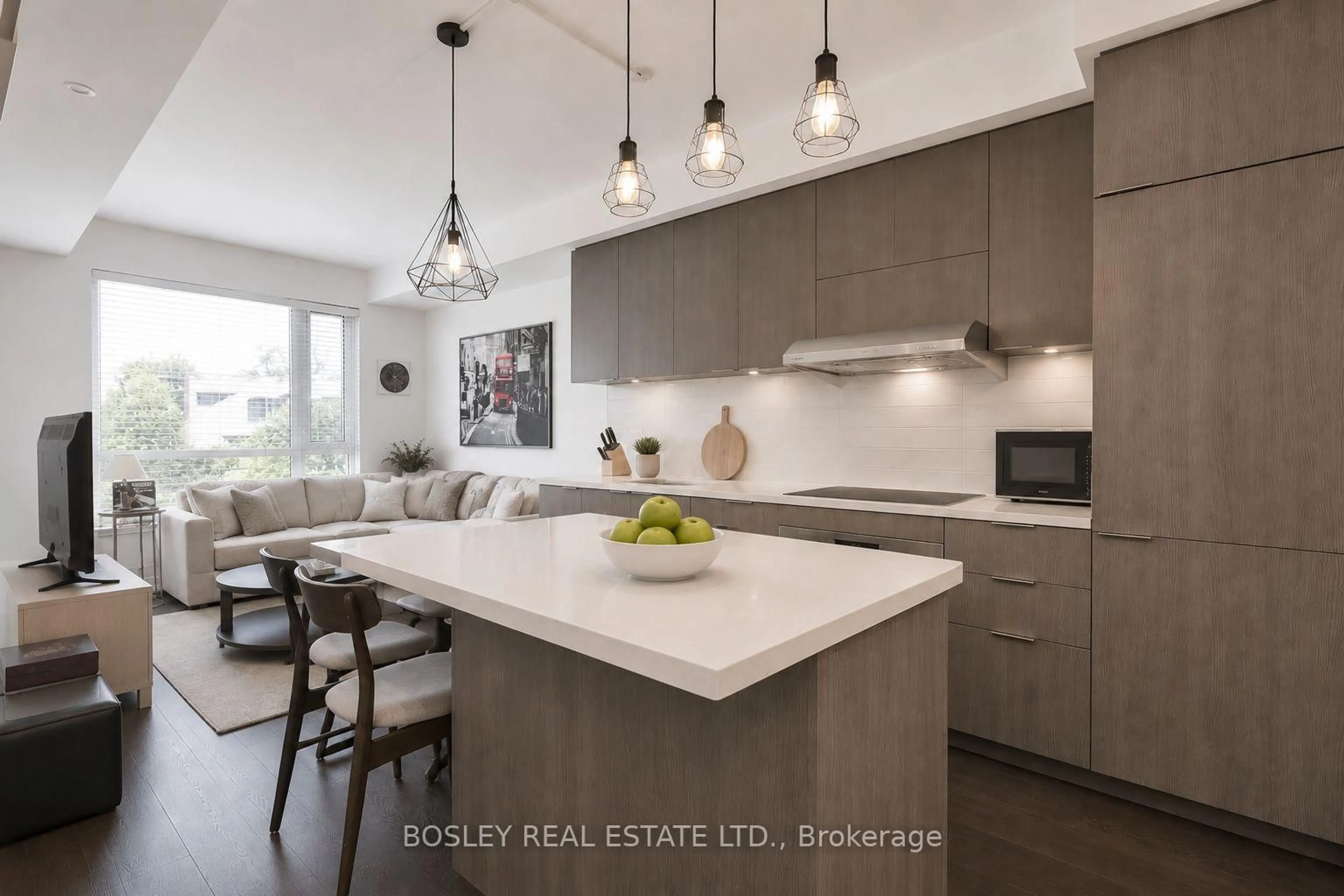 Open concept kitchen, wood/laminate floor for 223 St Clair Ave #209, Toronto Ontario M4V 1R3